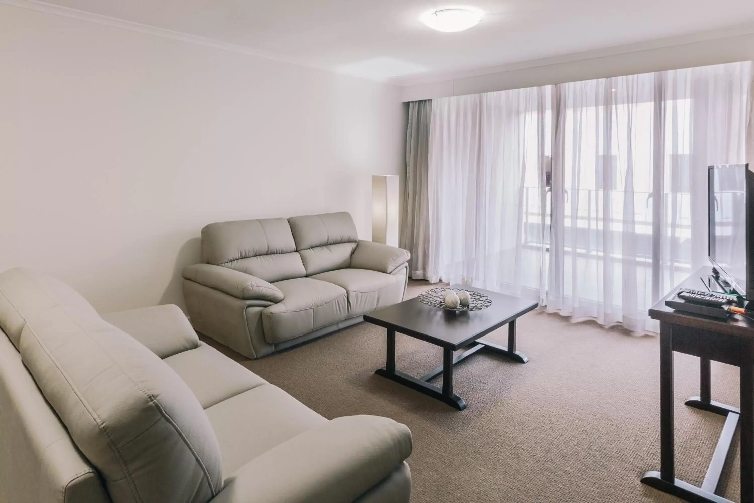 Living room, Seating Area in Newcastle Central Plaza Apartment Hotel