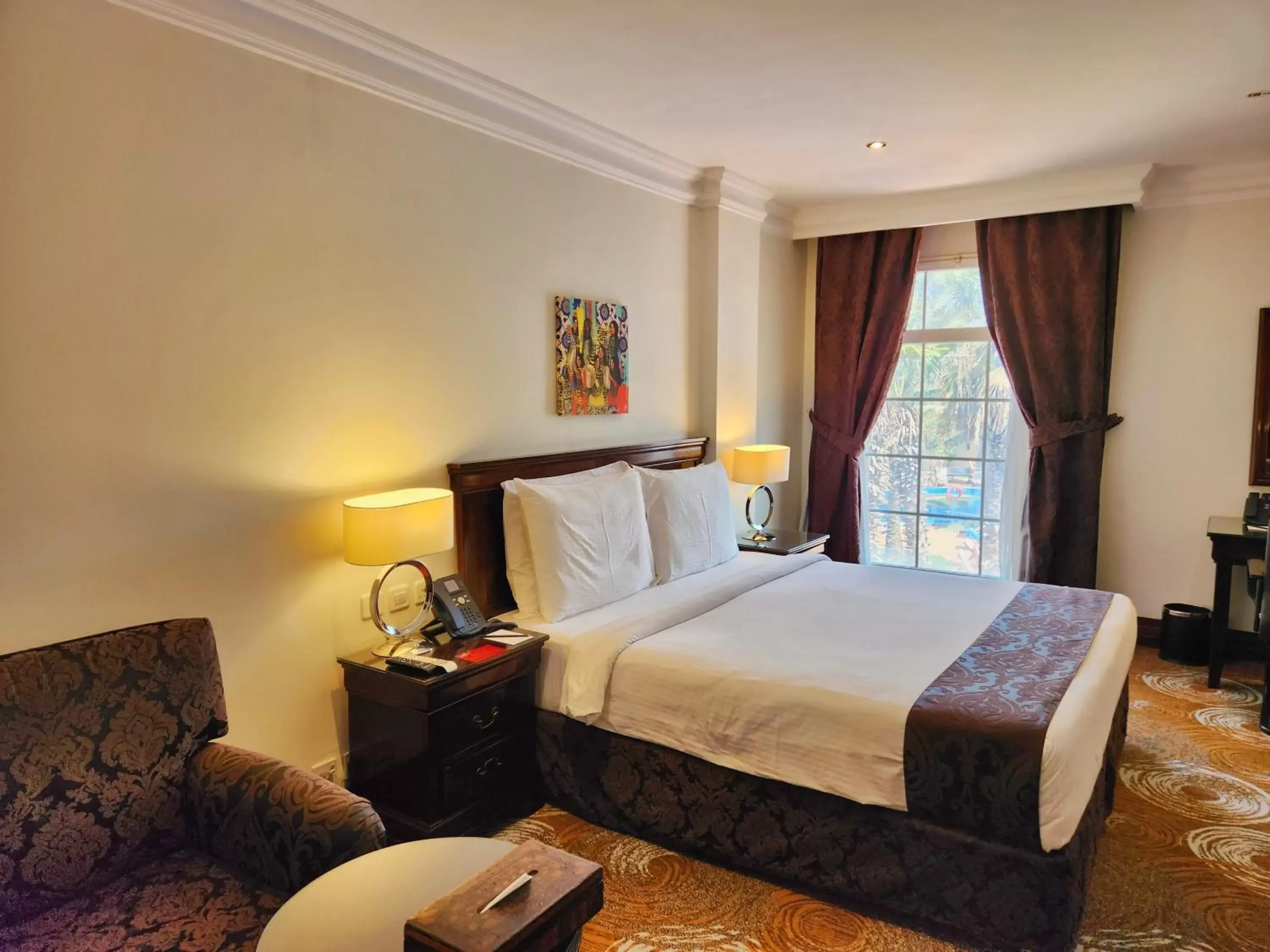 Property building, Bed in Mövenpick Hotel Kuwait Property building, Bed in Mövenpick Hotel Kuwait