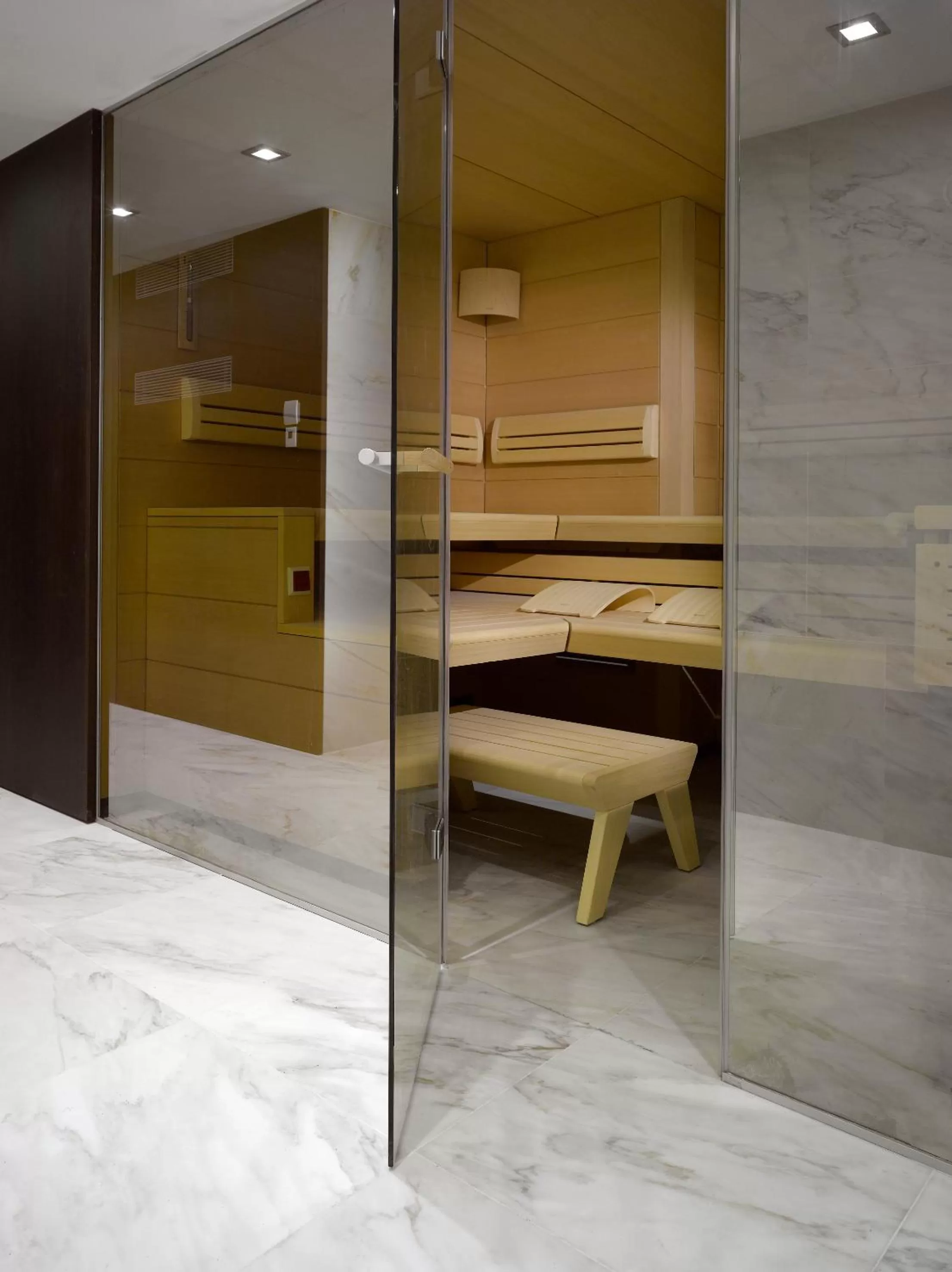 Sauna in Old Town Square Residence by Emblem