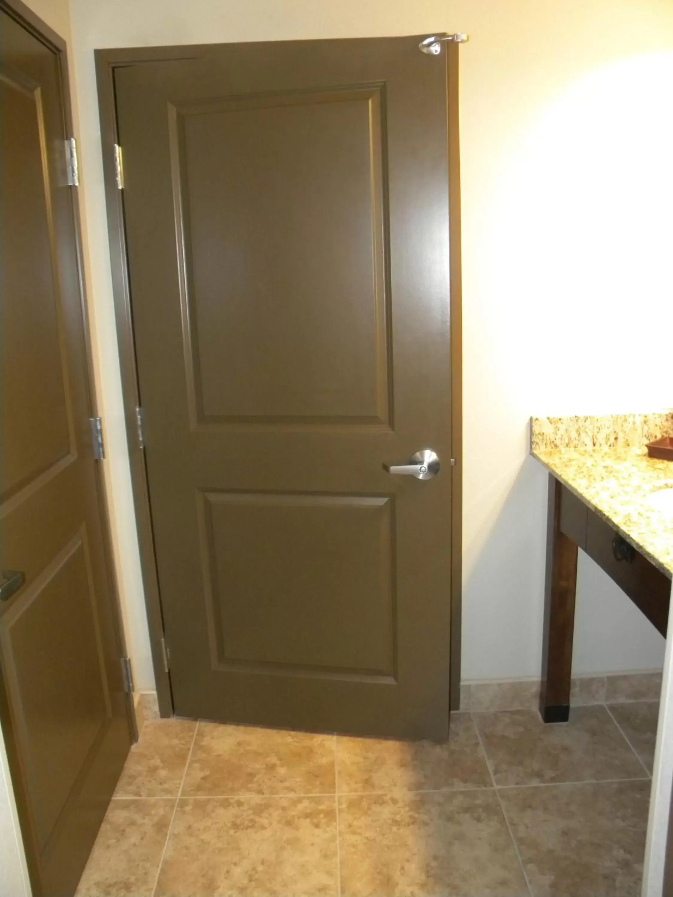 Bathroom in Teddy's Residential Suites Watford City