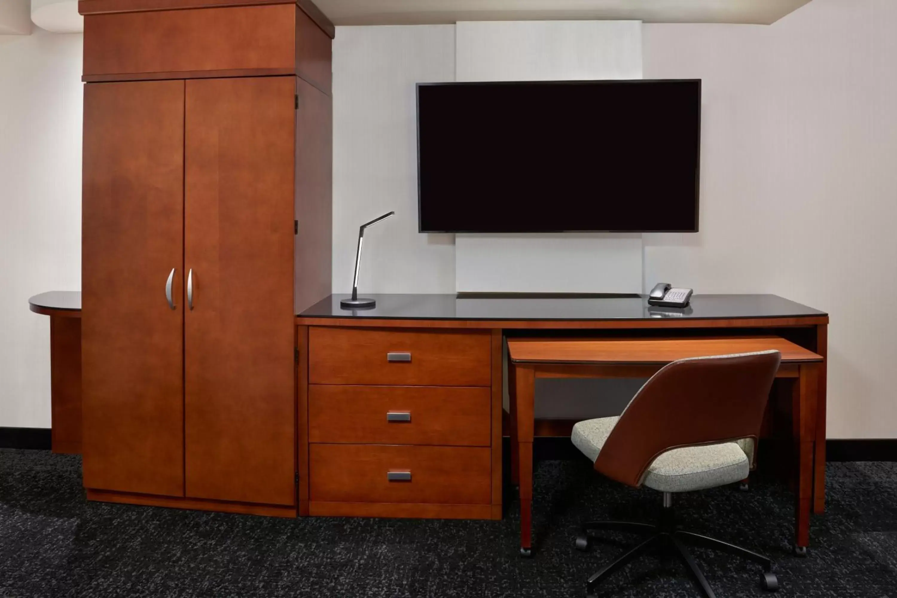 Photo of the whole room, TV/Entertainment Center in Courtyard by Marriott Calgary Airport