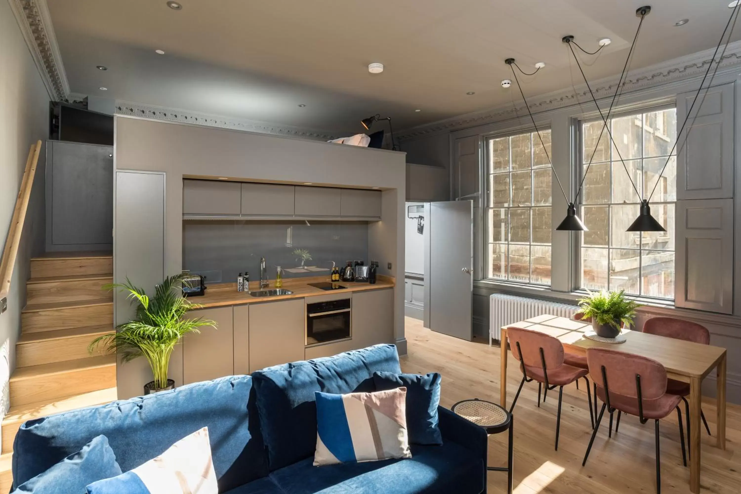 Kitchen/Kitchenette in Hiding Space - Trim Street Apartments