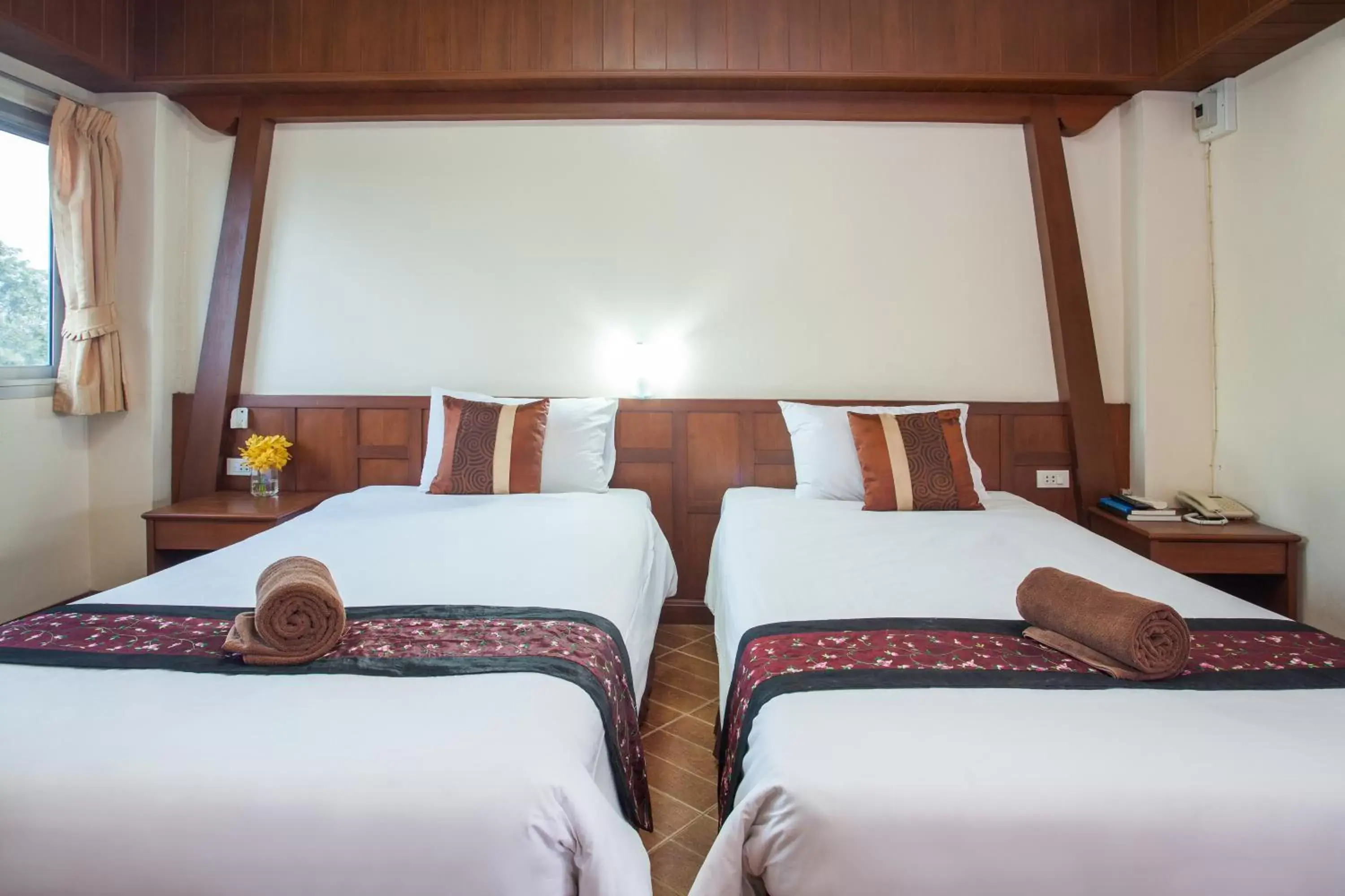 Bed in Diana Garden Resort - SHA Extra Plus