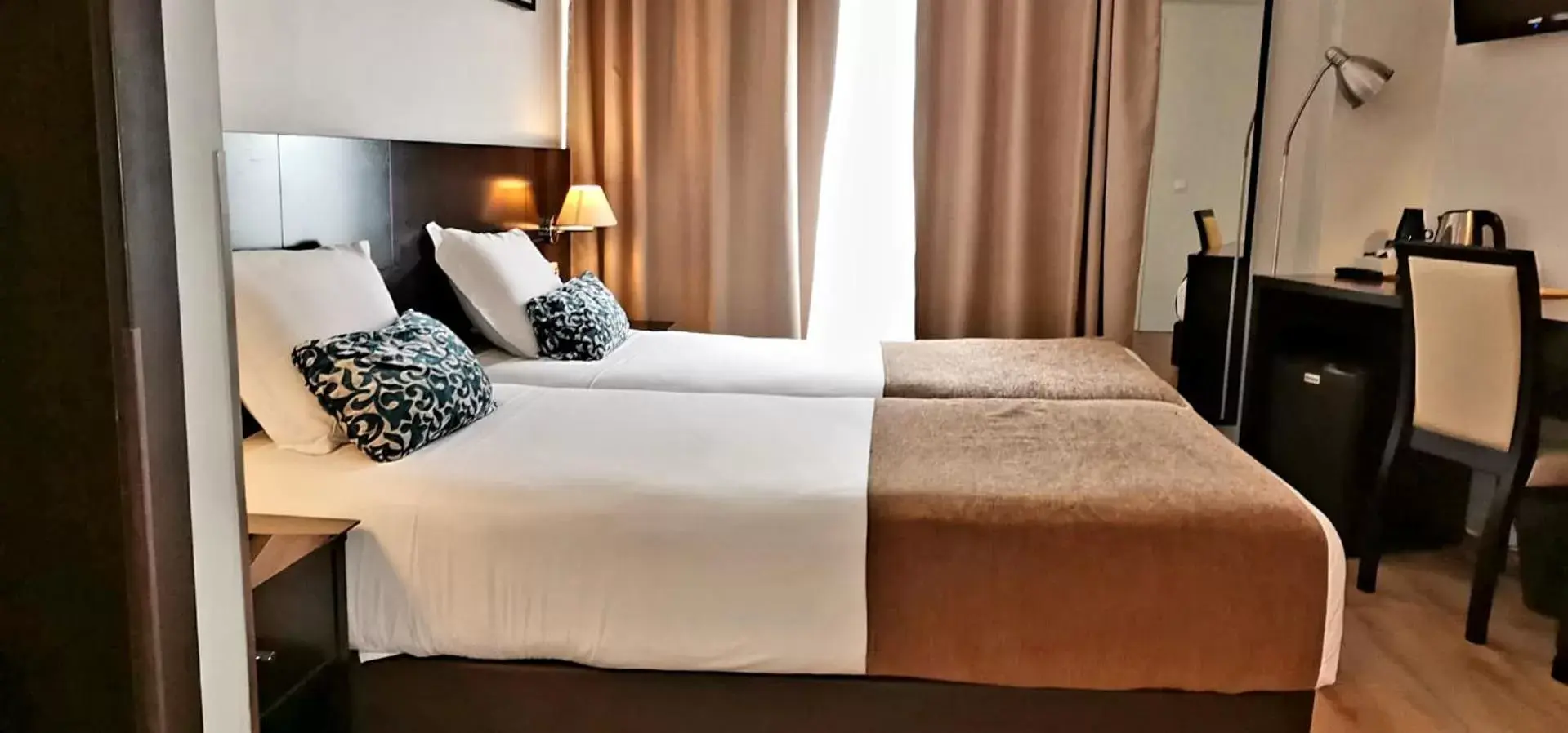 Bed in Lisbon City Hotel by City Hotels