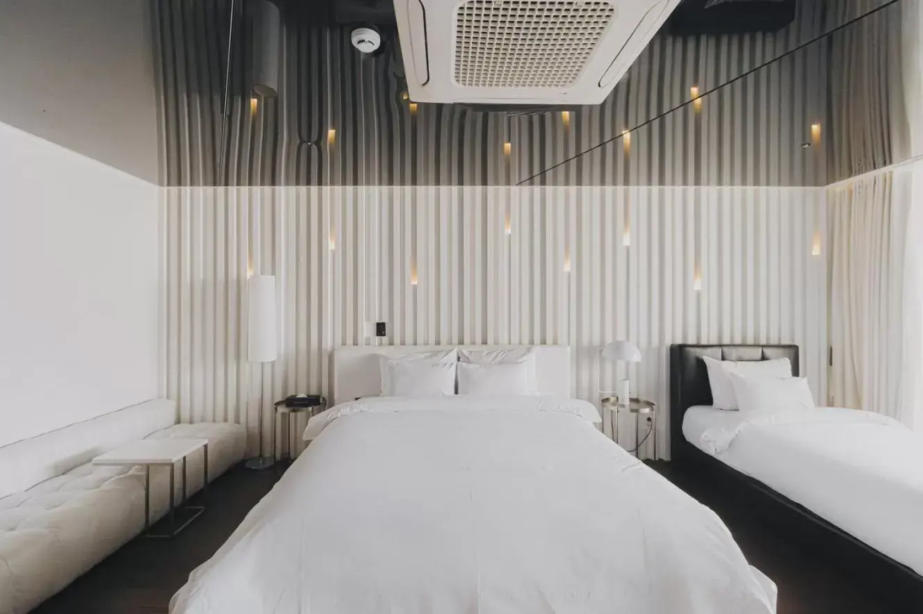 Bed in ACC Design Hotel