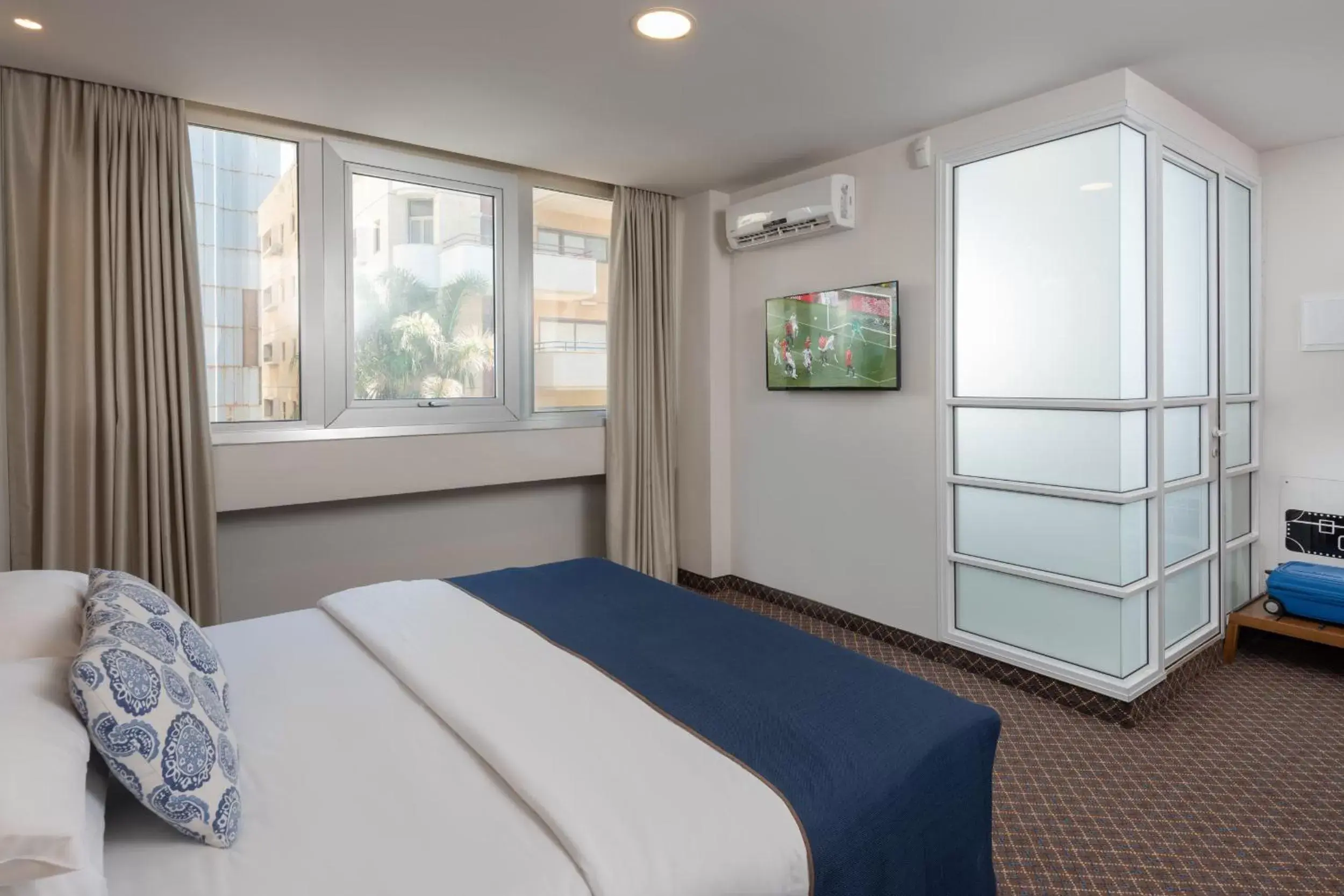 Bed in Embassy Hotel Tel Aviv