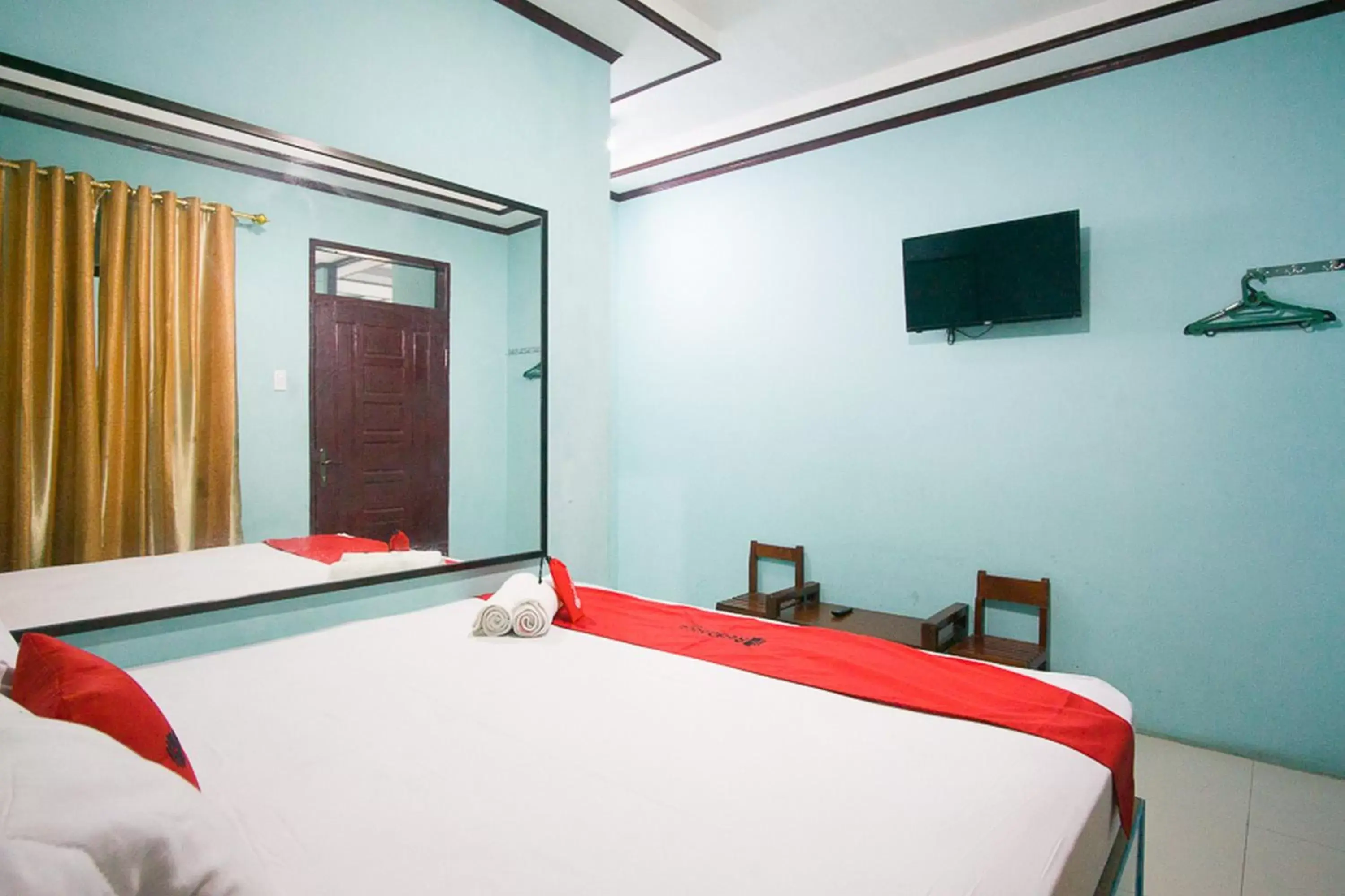 Bed in RedDoorz near Mikie Holiday Funland Berastagi