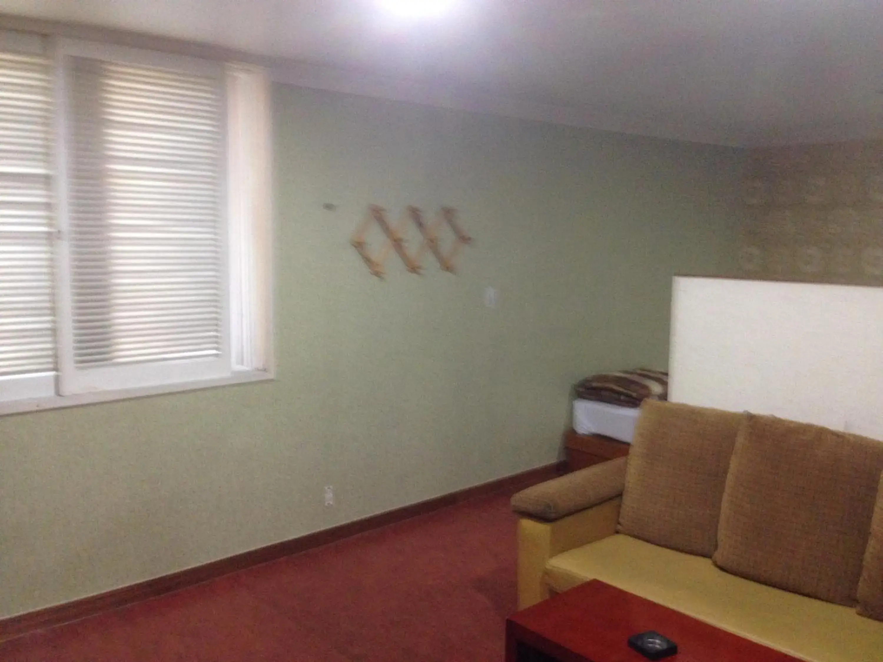 Photo of the whole room, Seating Area in Goodstay Herotel