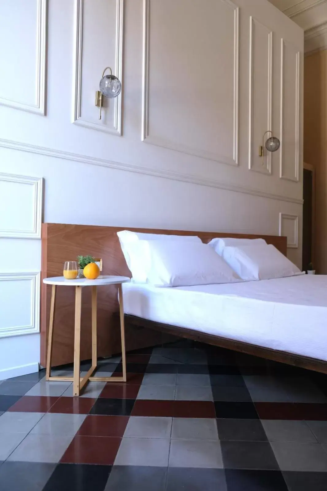 Bed in Toscano Palace Luxury Rooms Catania