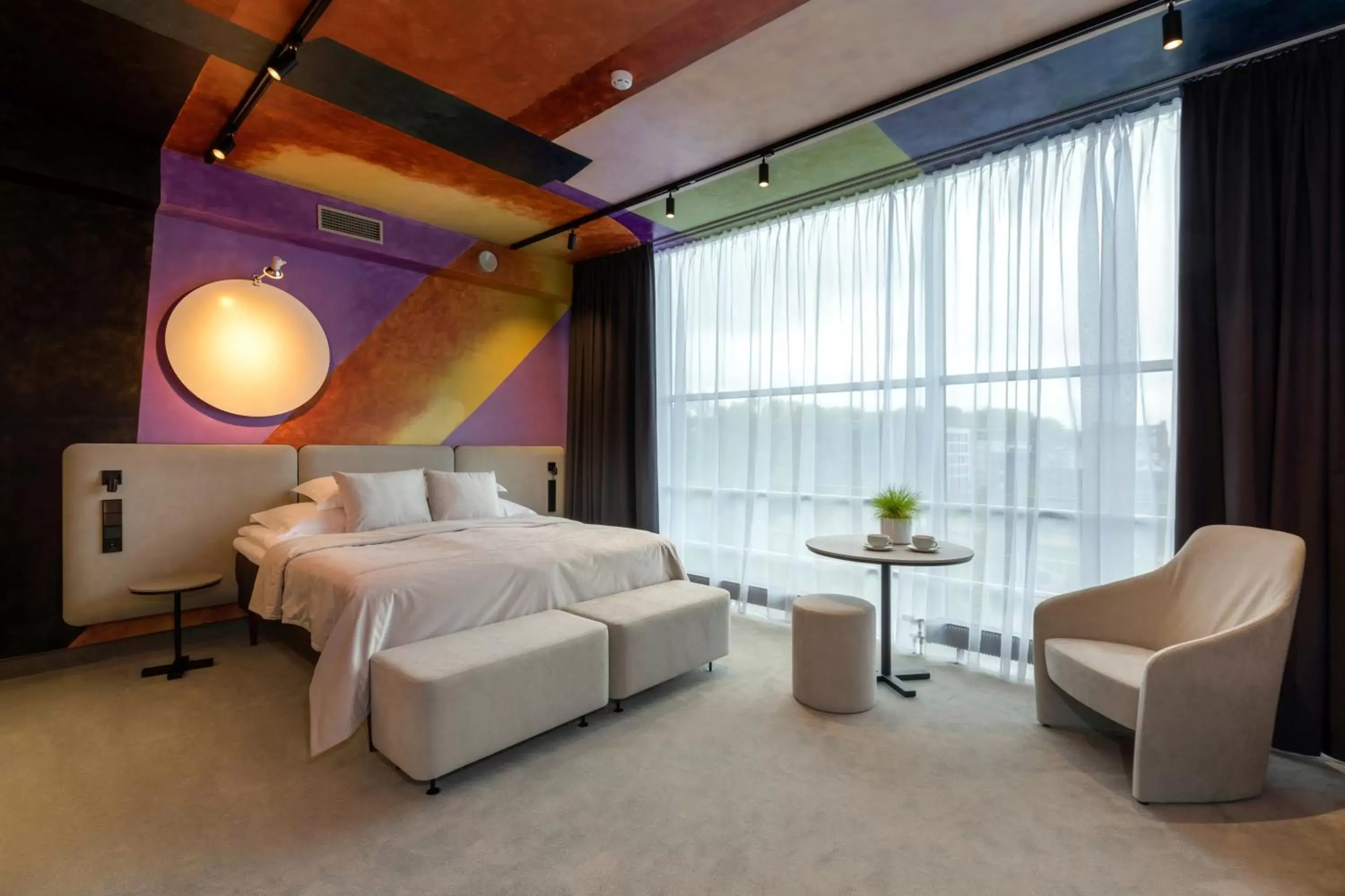 Bed in Art Hotel Pallas by Tartuhotels