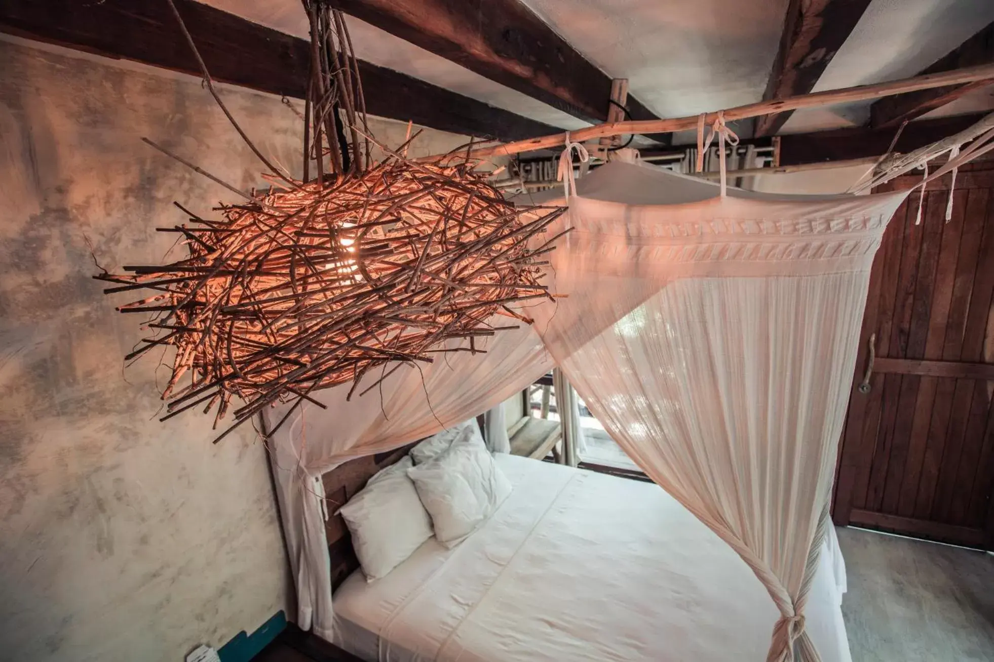 Bed in Hidden Treehouse Tulum Eco-Hotel