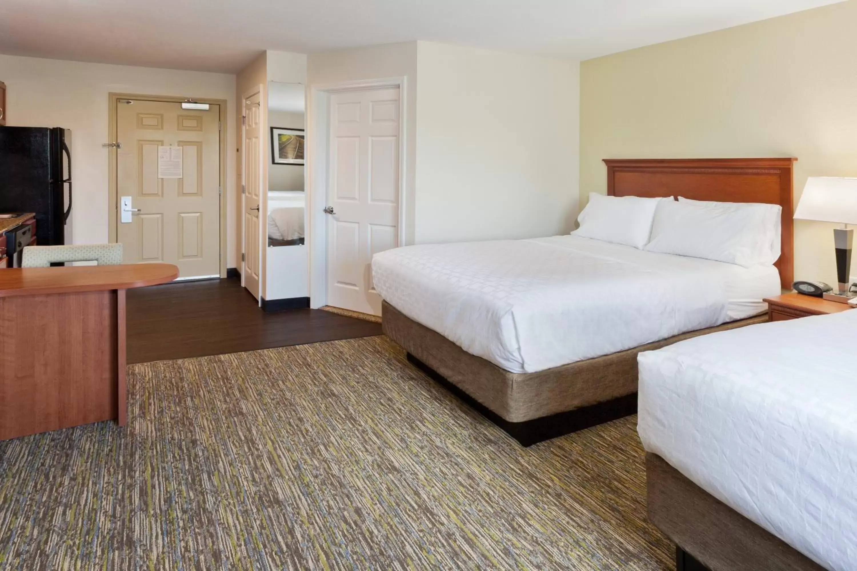 Photo of the whole room, Bed in Candlewood Suites Eastchase Park, an IHG Hotel