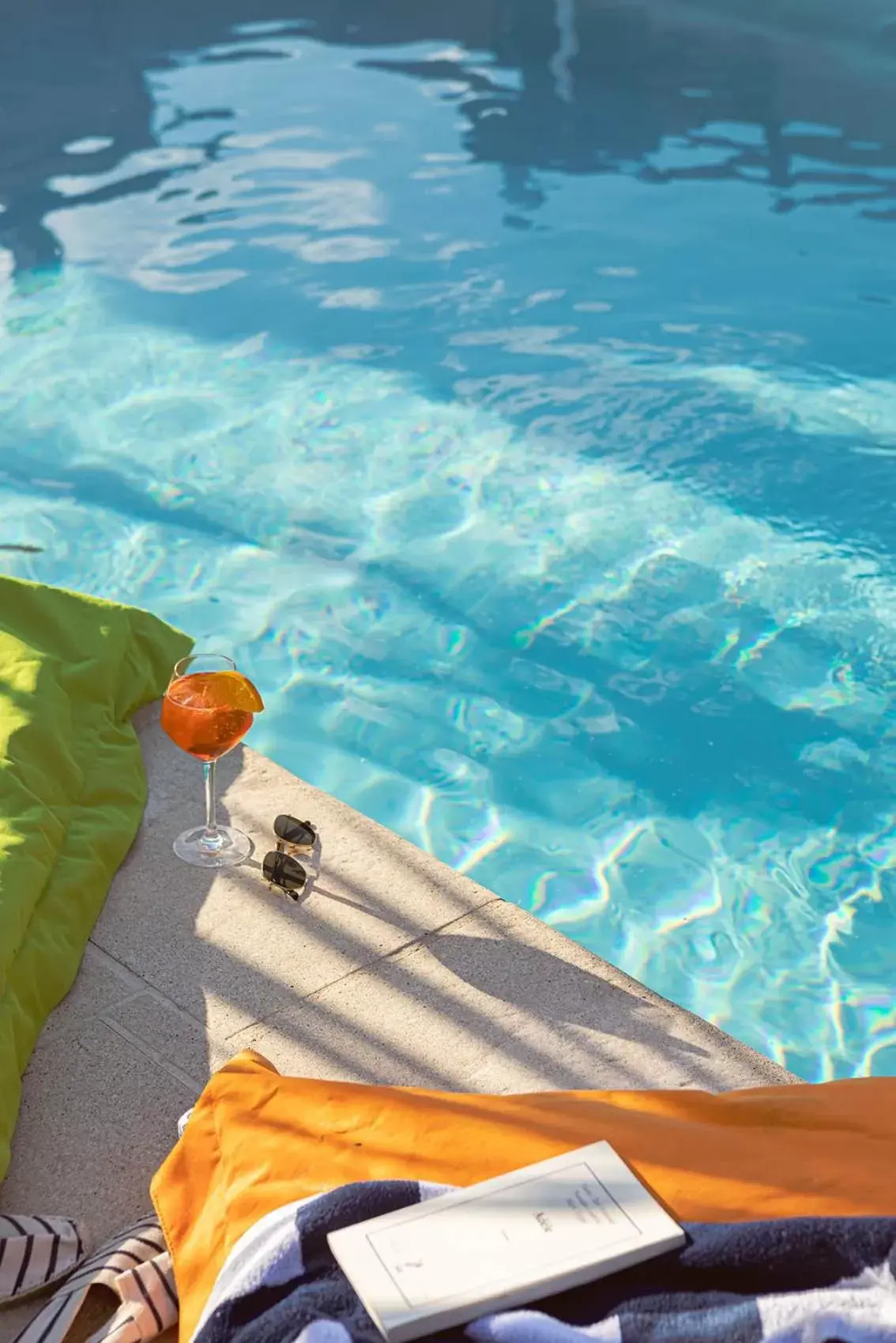 Pool view in Contact Hôtels Les Pierres Dorées Pool view in Contact Hôtels Les Pierres Dorées