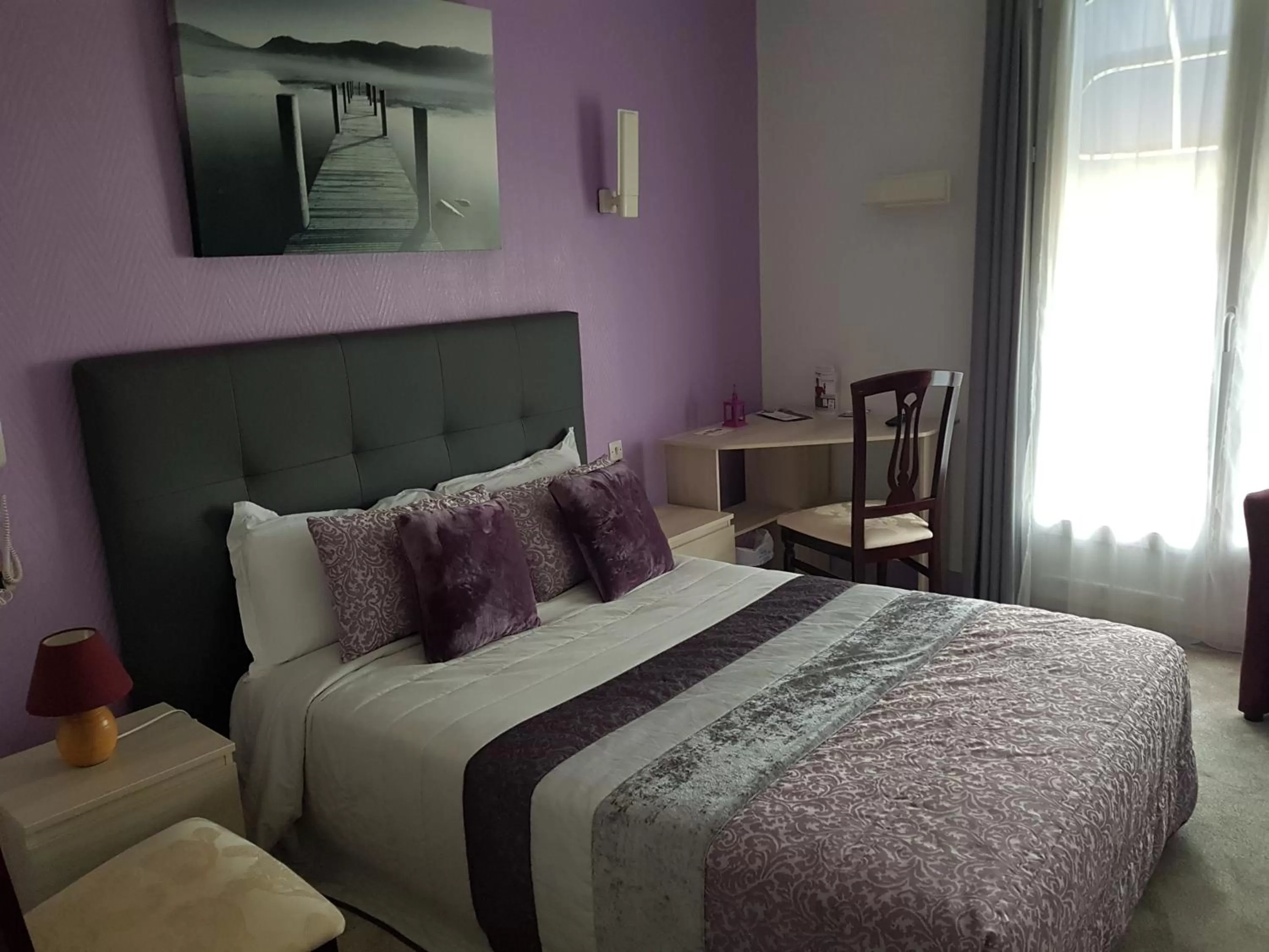 Bed in Hotel Christina