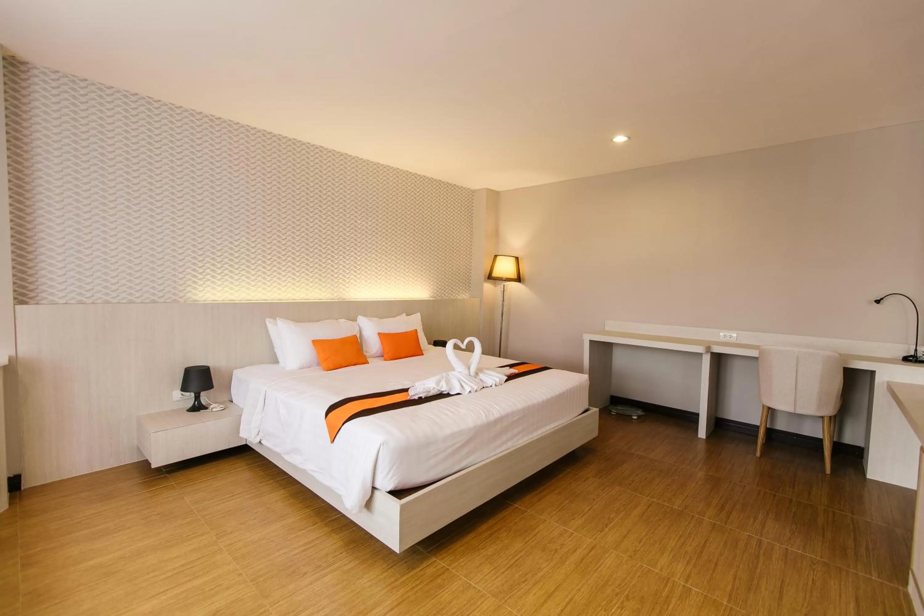 Bed in De Hug Hotel & Residence