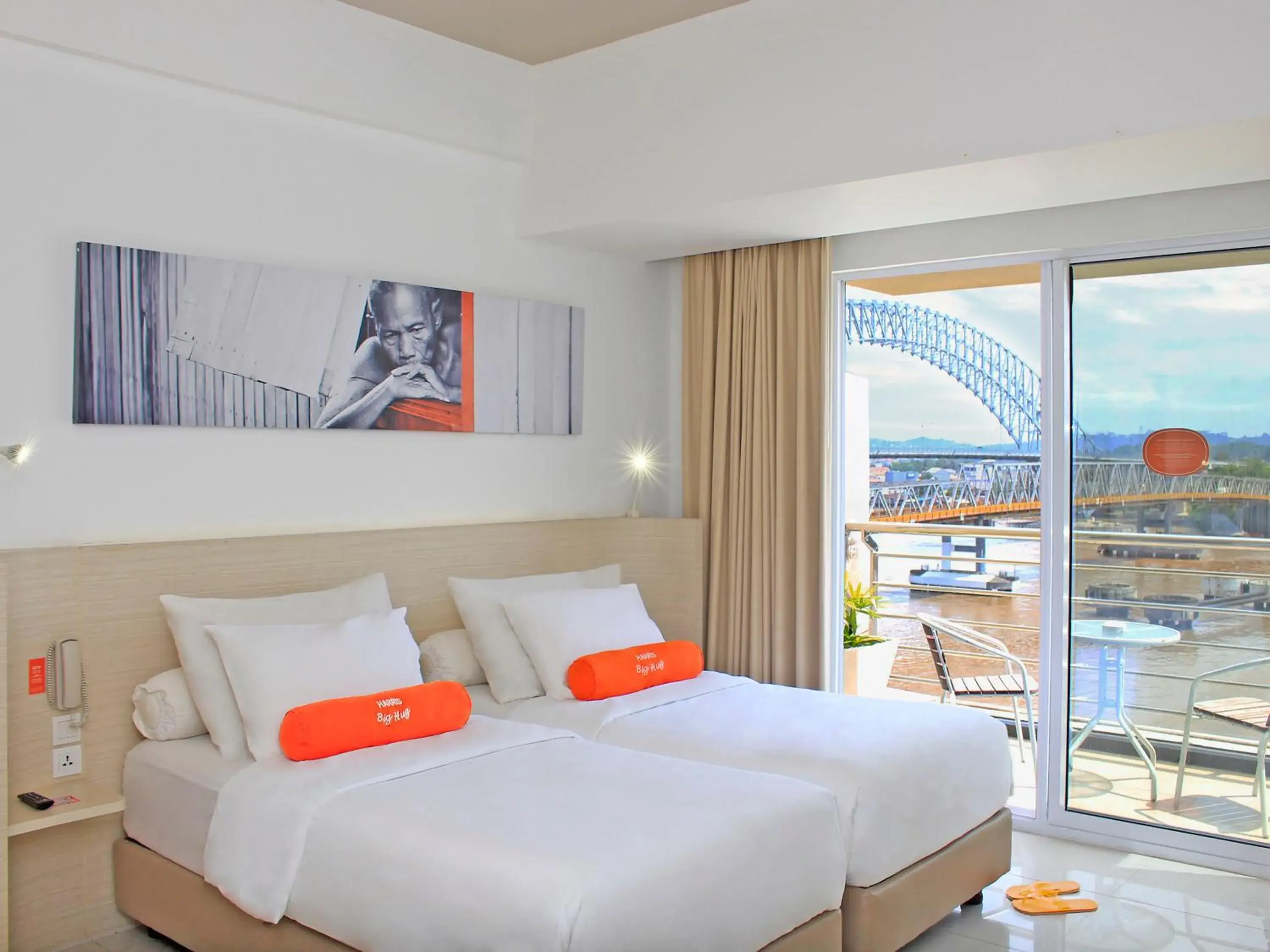 Bed in HARRIS Hotel Samarinda Bed in HARRIS Hotel Samarinda