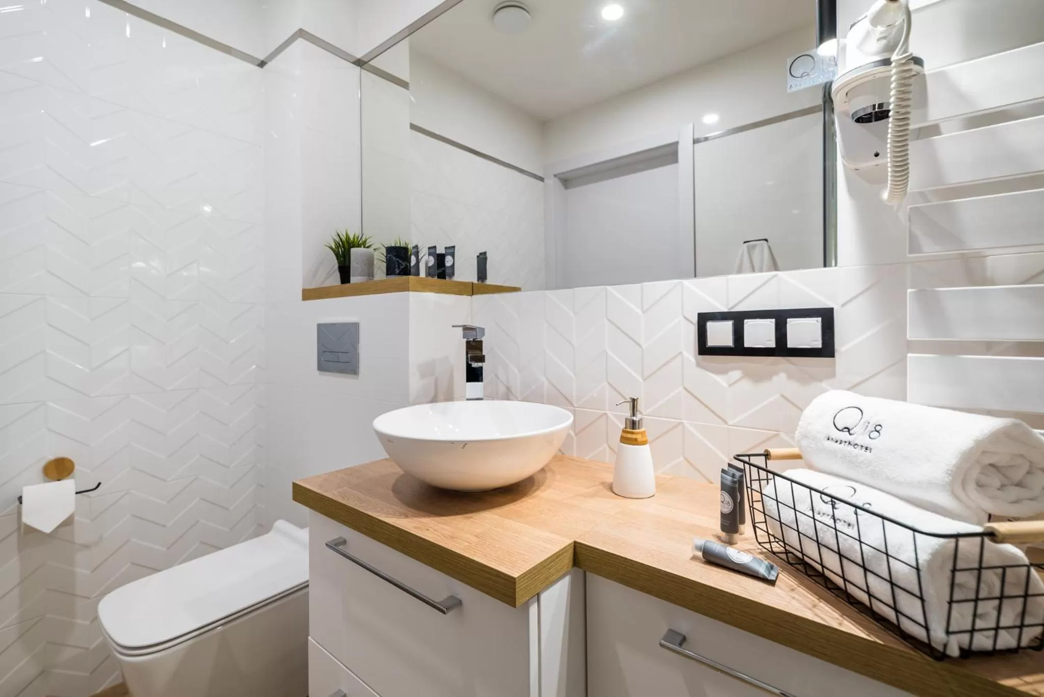 Bathroom in Q18 ApartHotel