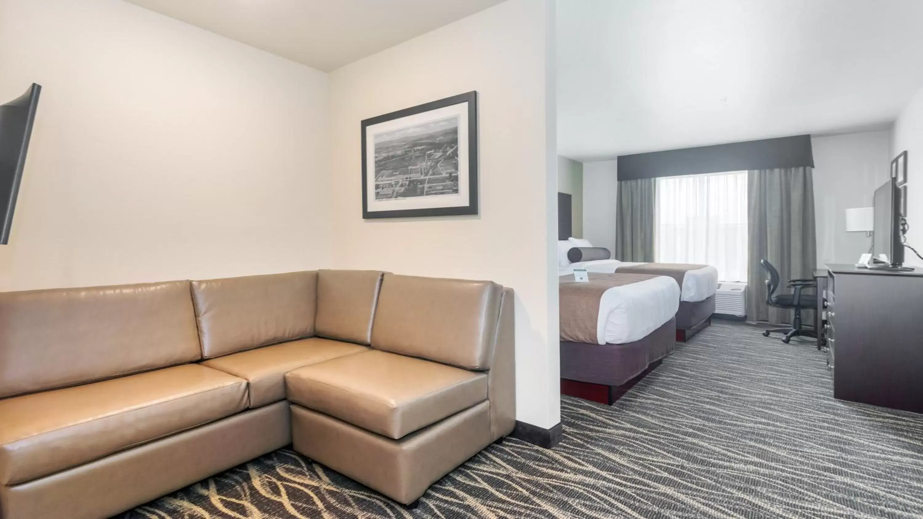 Photo of the whole room, Seating Area in Cobblestone Hotel & Suites - Janesville