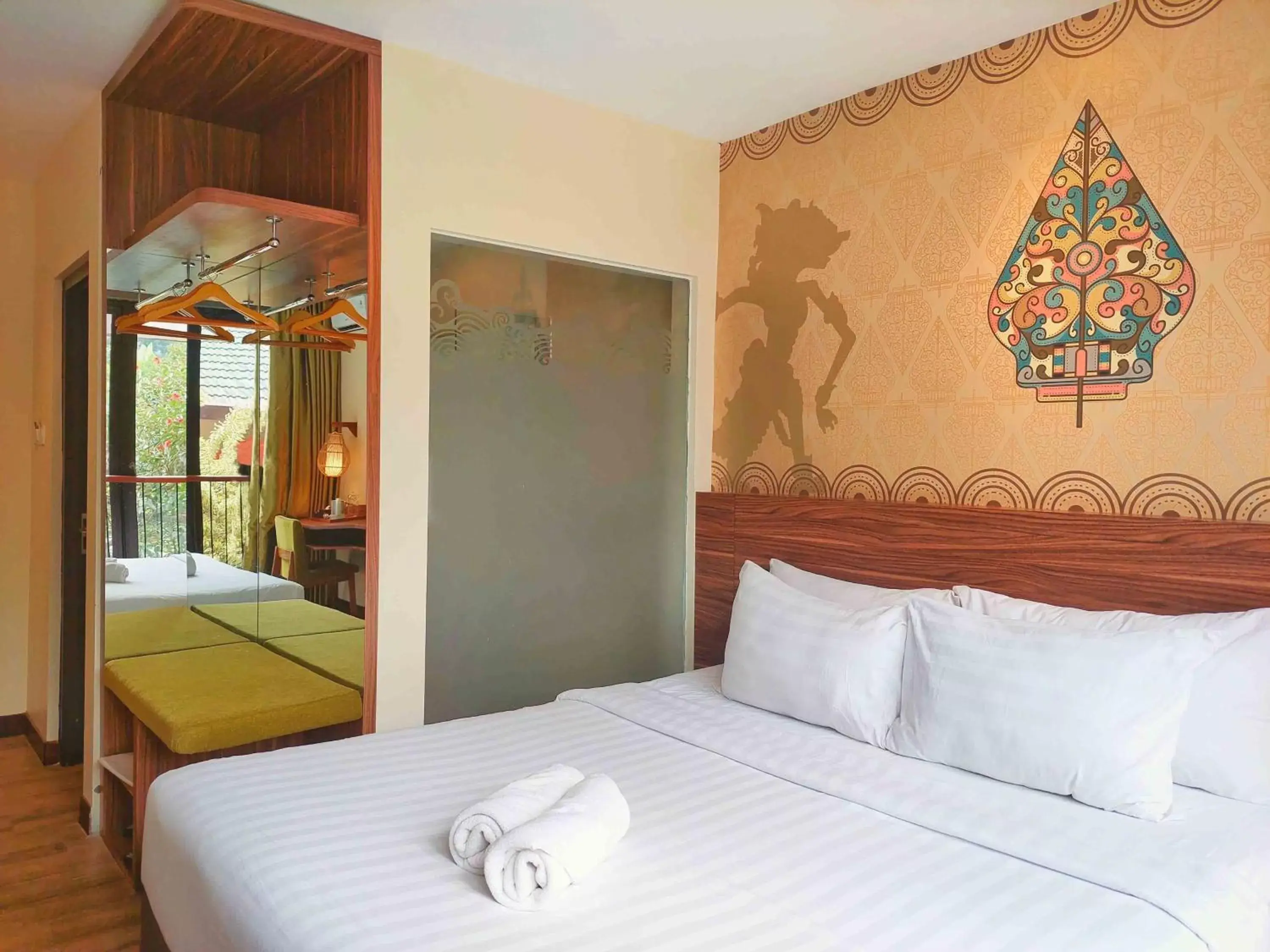 Bed in The Batu Hotel & Villas