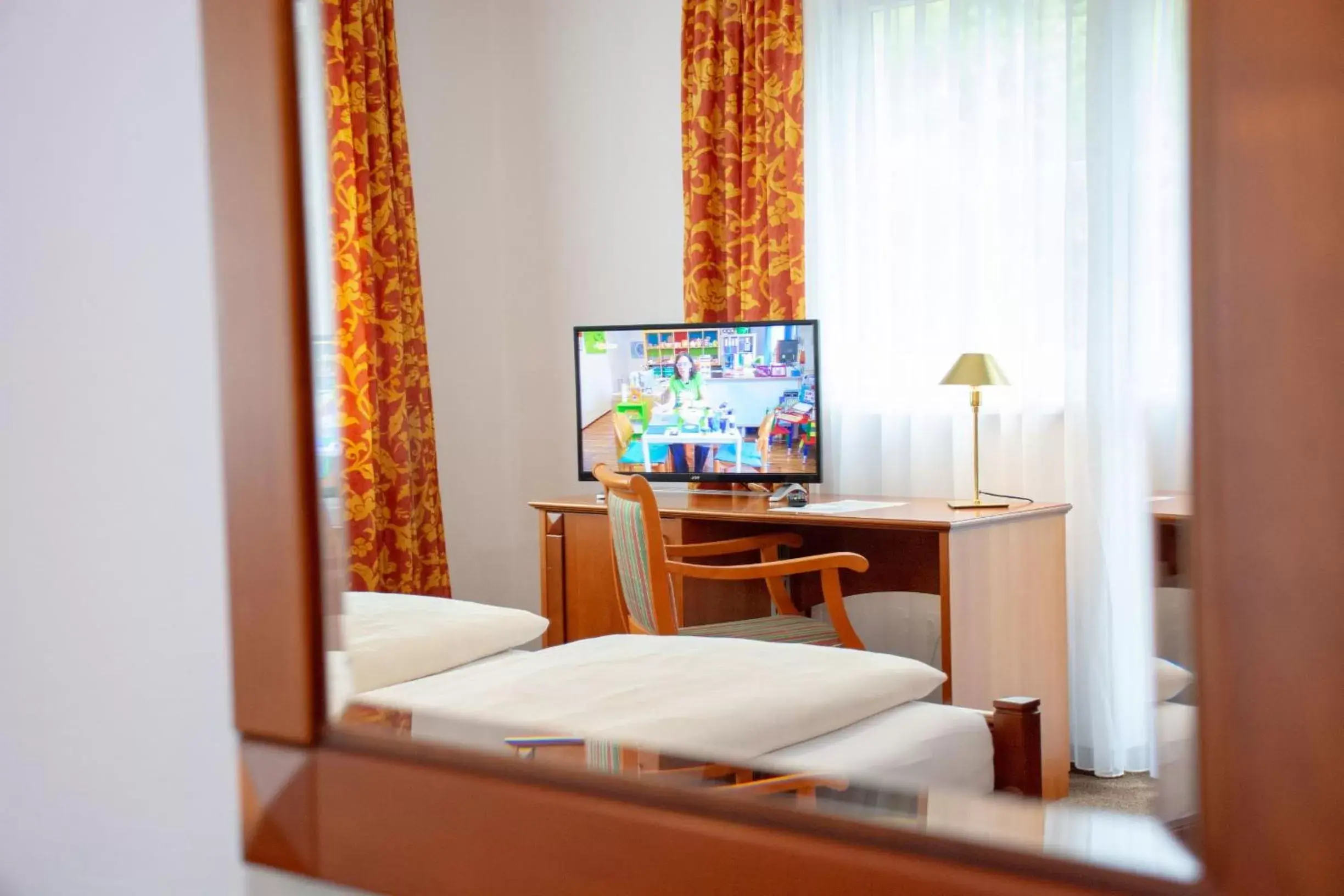 Photo of the whole room, TV/Entertainment Center in Landhotel Post Ebensee am Traunsee ***S