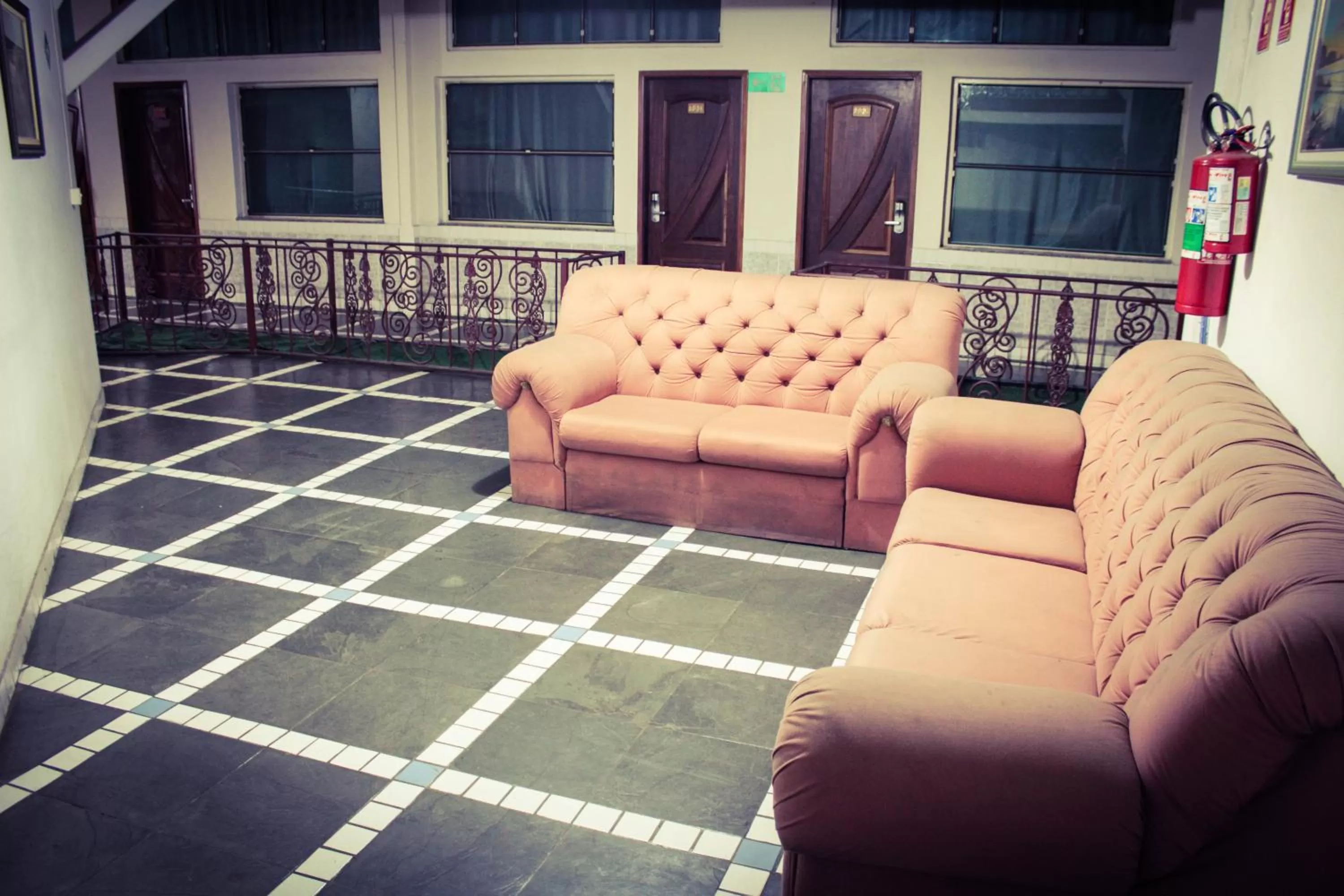 Communal lounge/ TV room in Cumbipar King Hotel