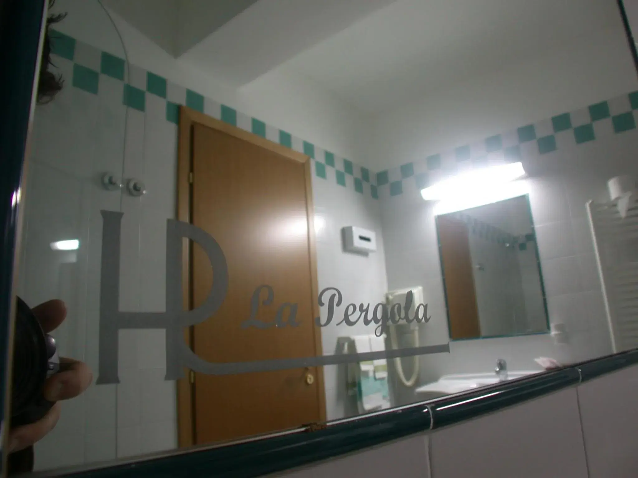 Bathroom, Logo/Certificate/Sign/Award in Hotel La Pergola