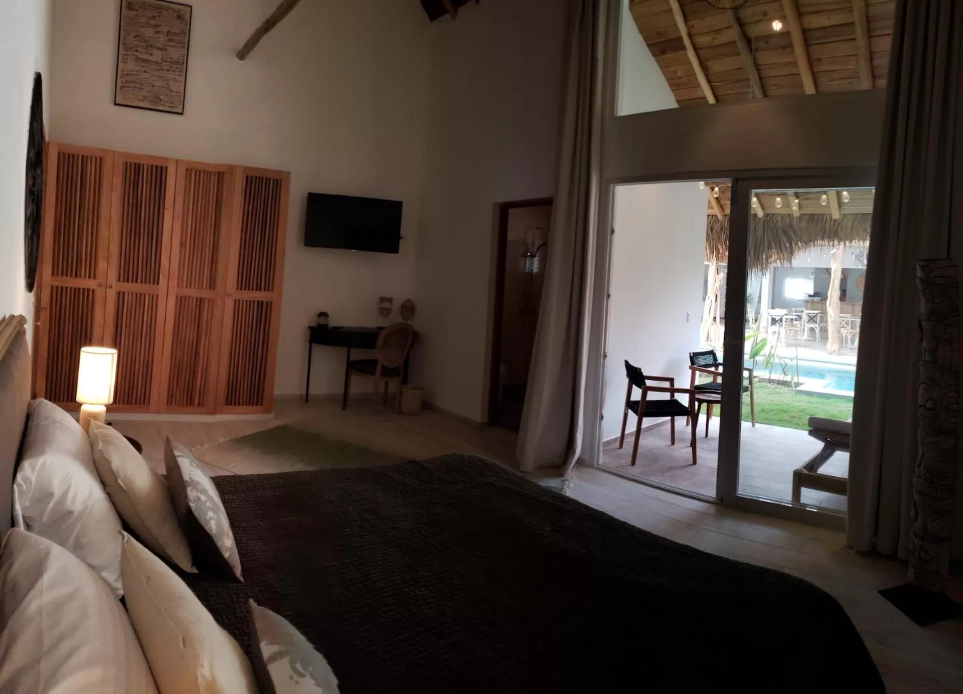 Bed in TAKUMA BOUTIK HOTEL