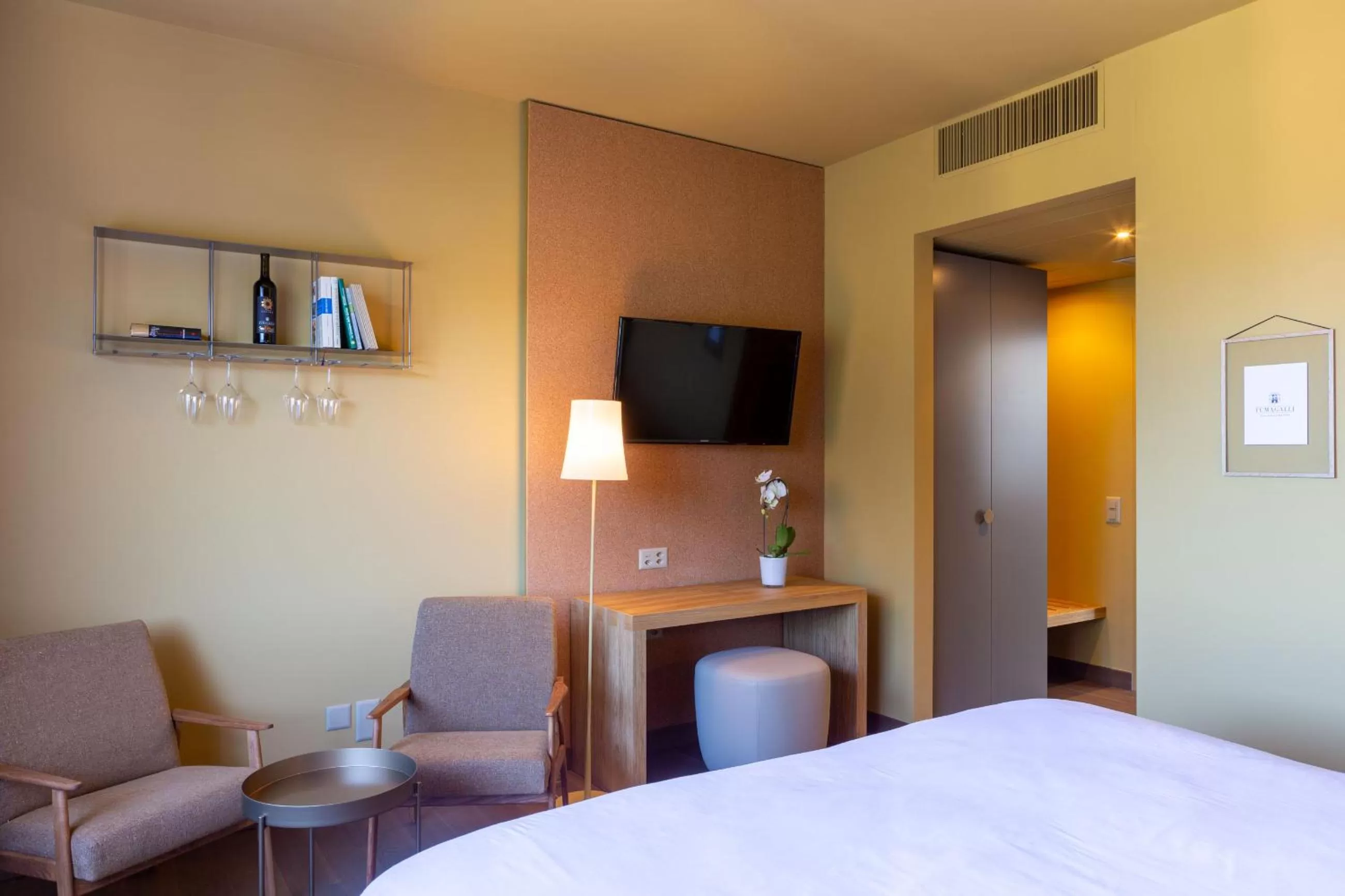 Bed in Conca Bella Boutique Hotel & Wine Experience