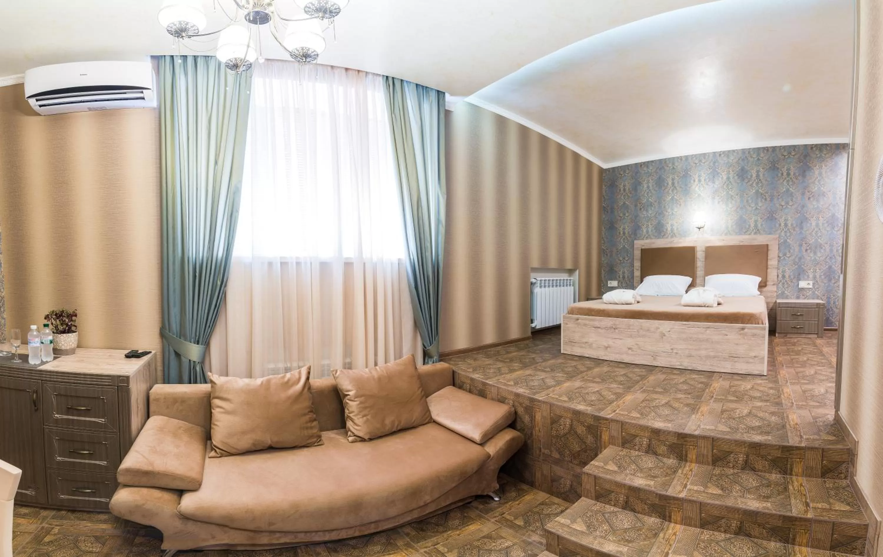 Bed in L.O.Y Family Hotel