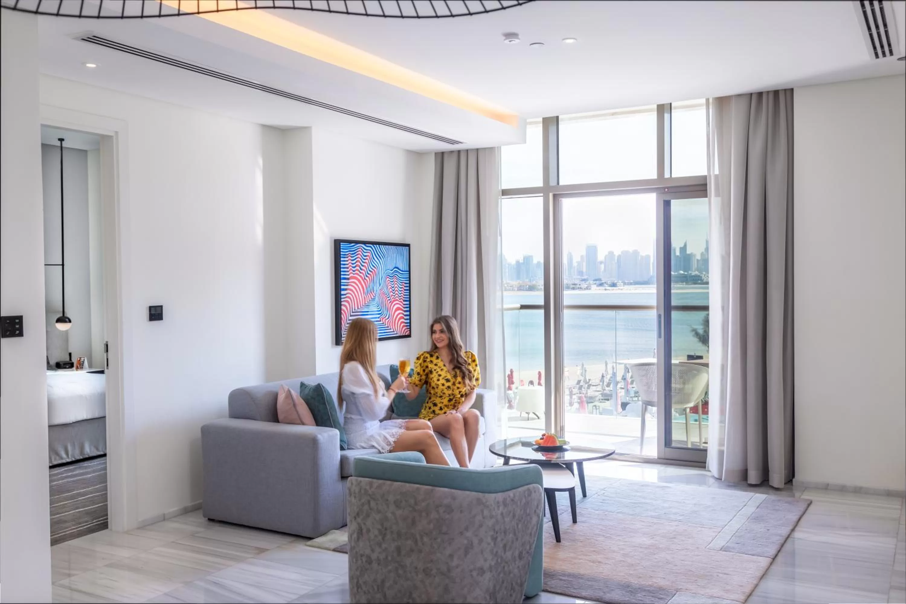 Seating area in Th8 Palm Dubai Beach Resort Vignette Collection, an IHG hotel