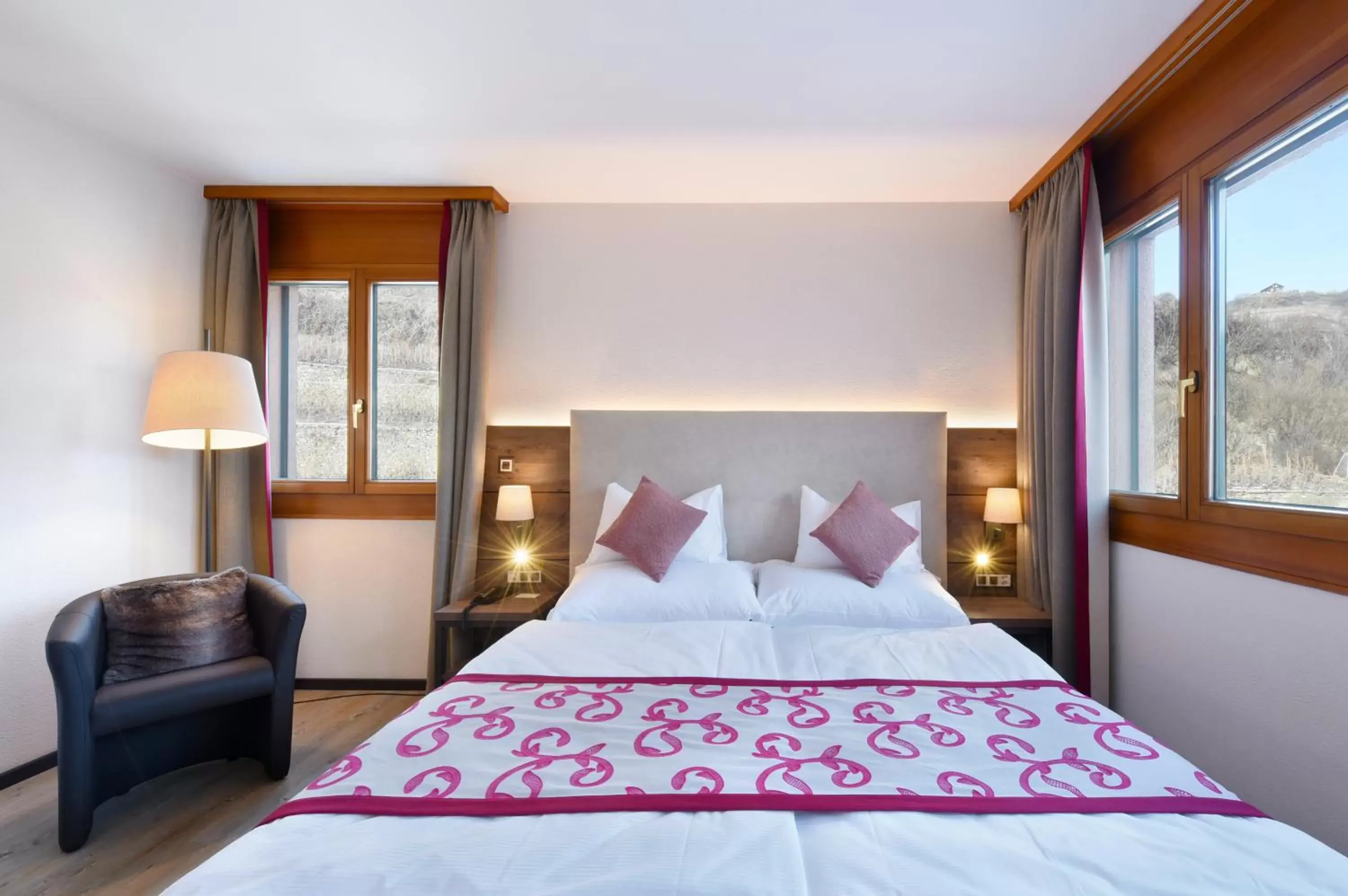 Bed in Hôtel des Vignes