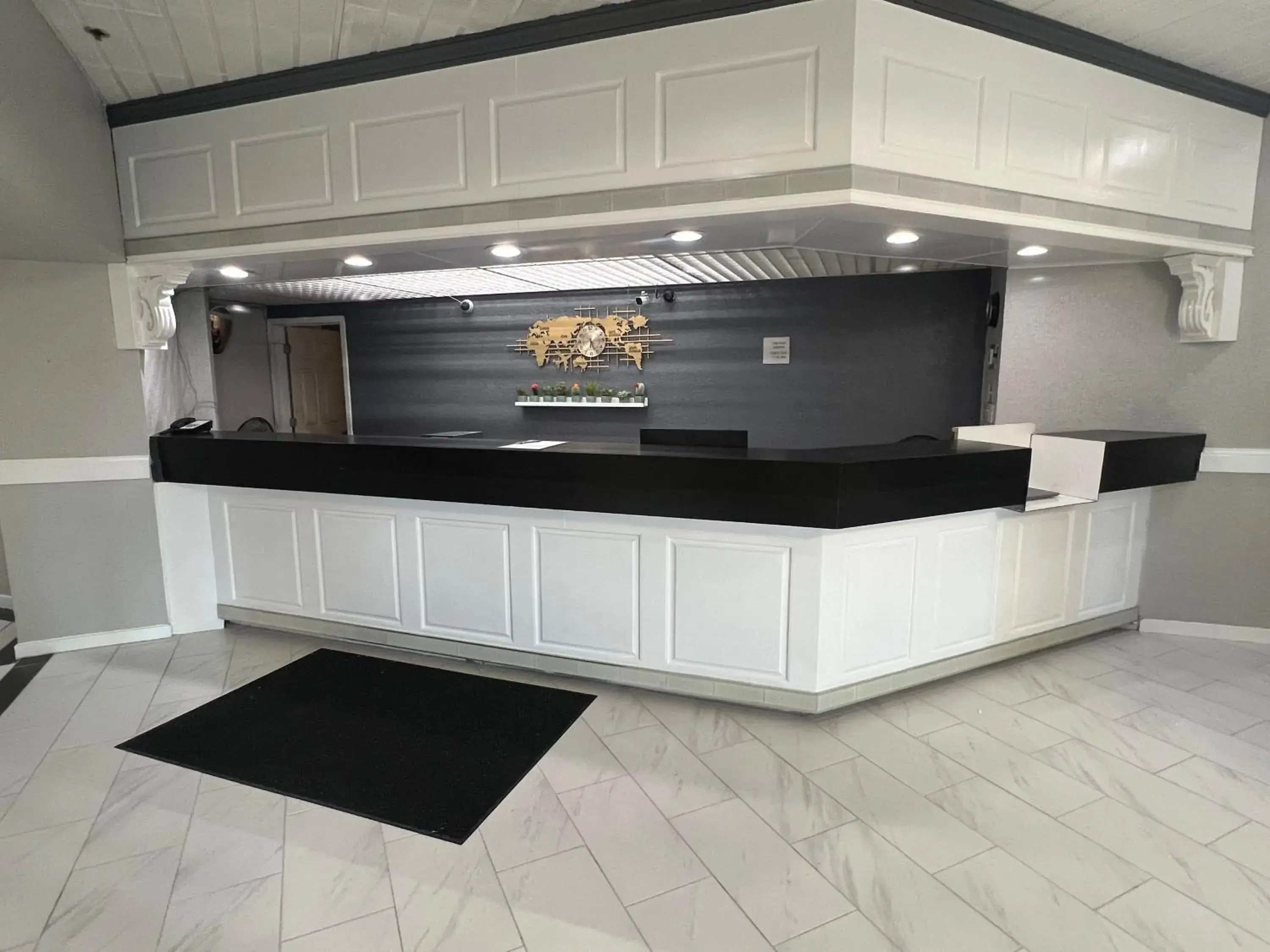 Lobby or reception in The Lodge Hotel and Banquets Lobby or reception in The Lodge Hotel and Banquets