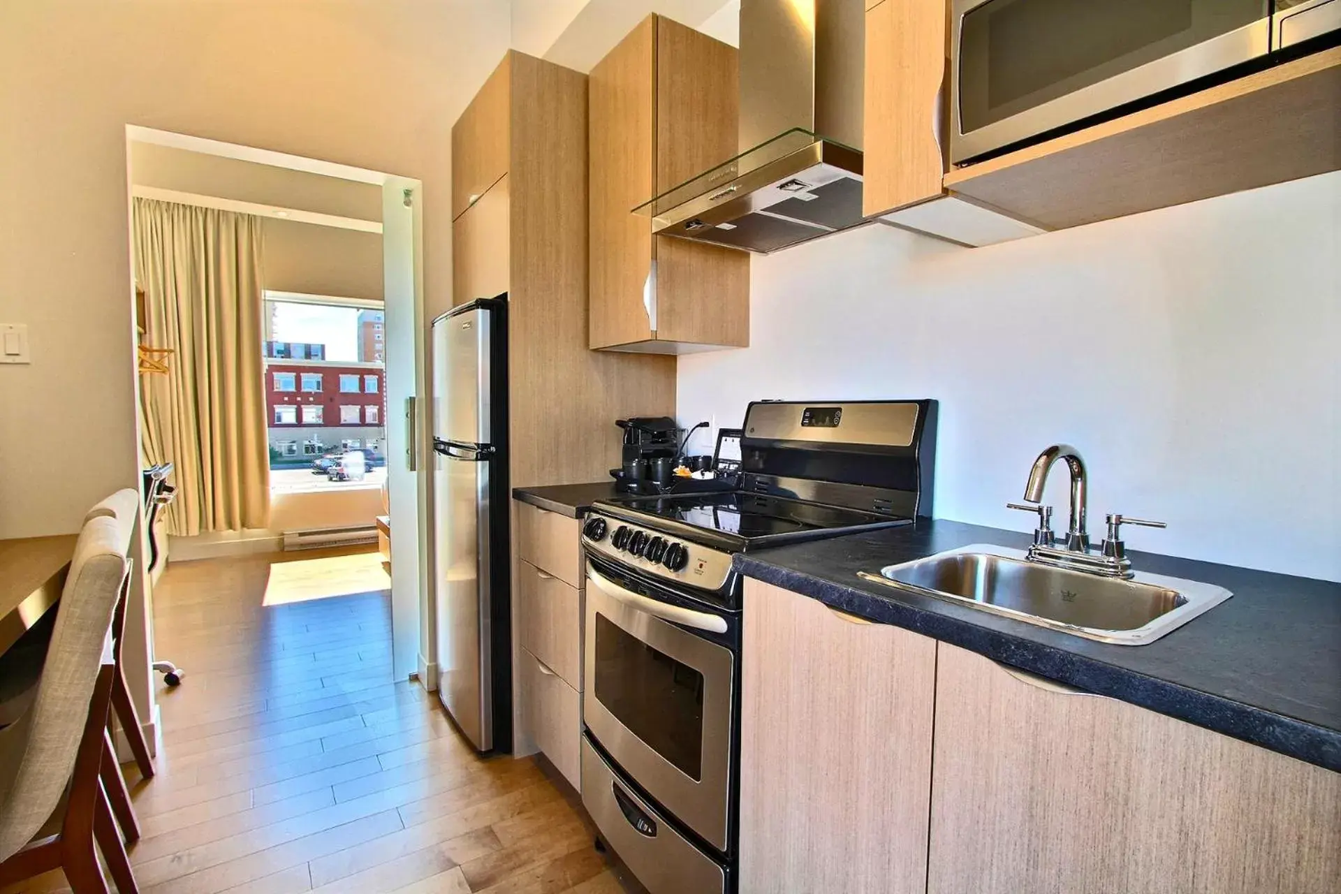 Kitchen or kitchenette, Kitchen/Kitchenette in Hôtel Le Navigateur