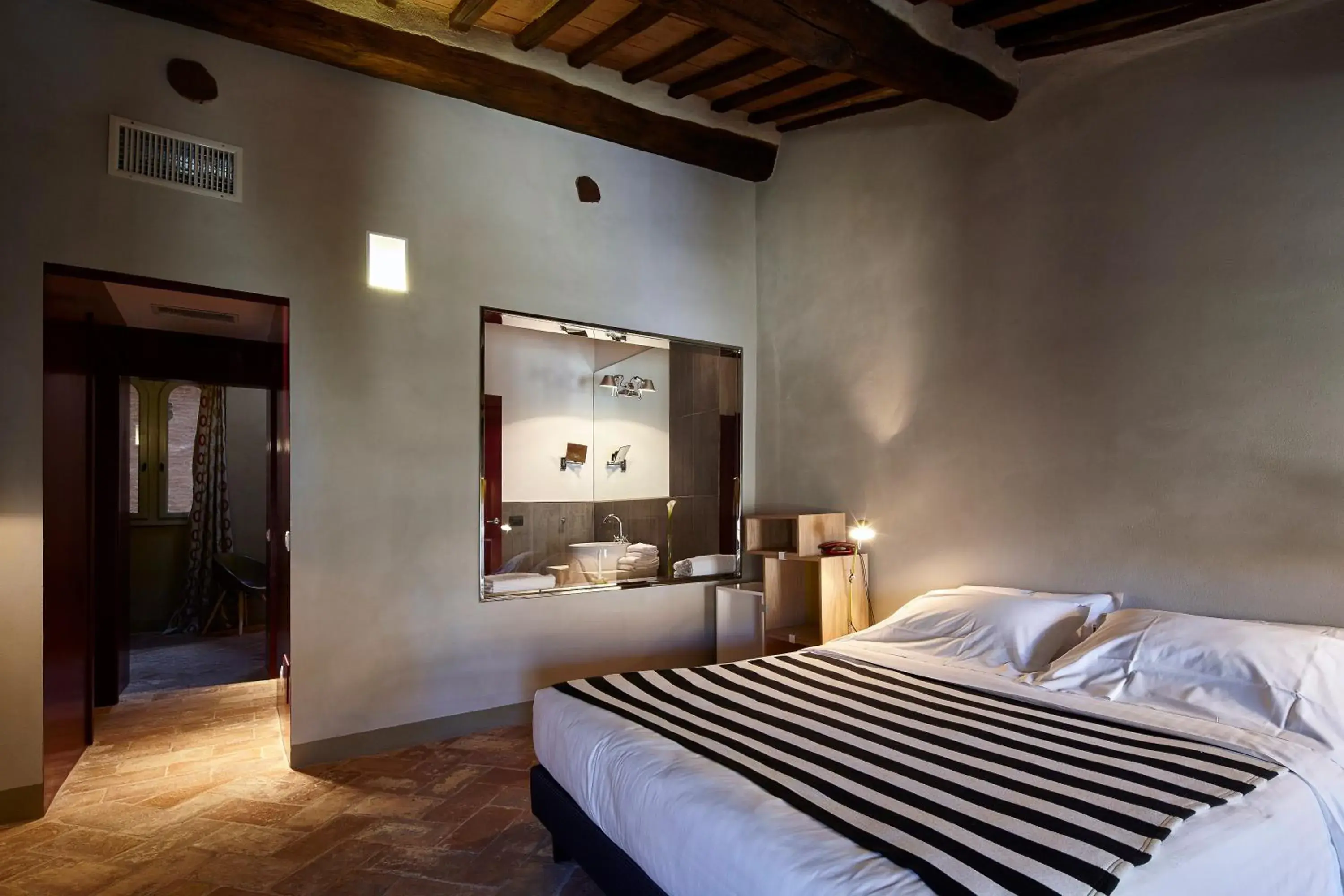 Bed in Palazzetto Rosso - Art Hotel