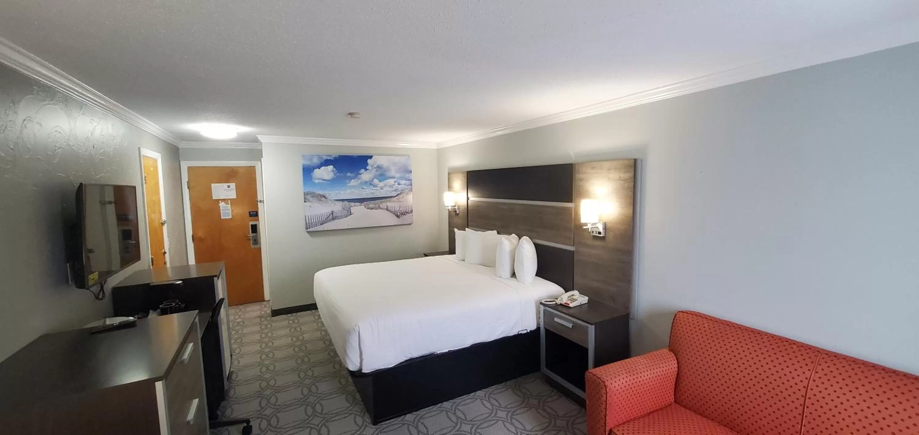 Bed in Ambassador Inn and Suites