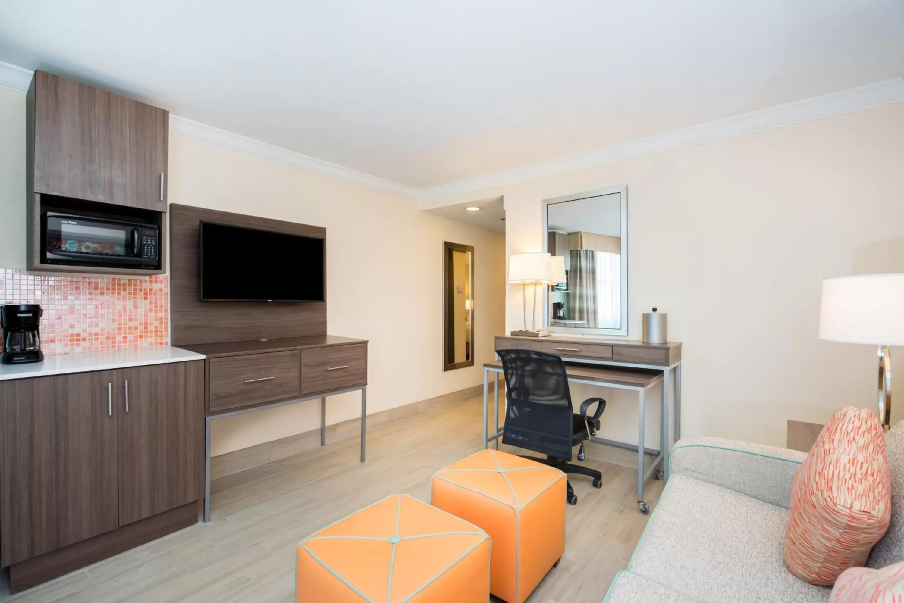 Photo of the whole room, TV/Entertainment Center in Holiday Inn Express & Suites Nassau, an IHG Hotel