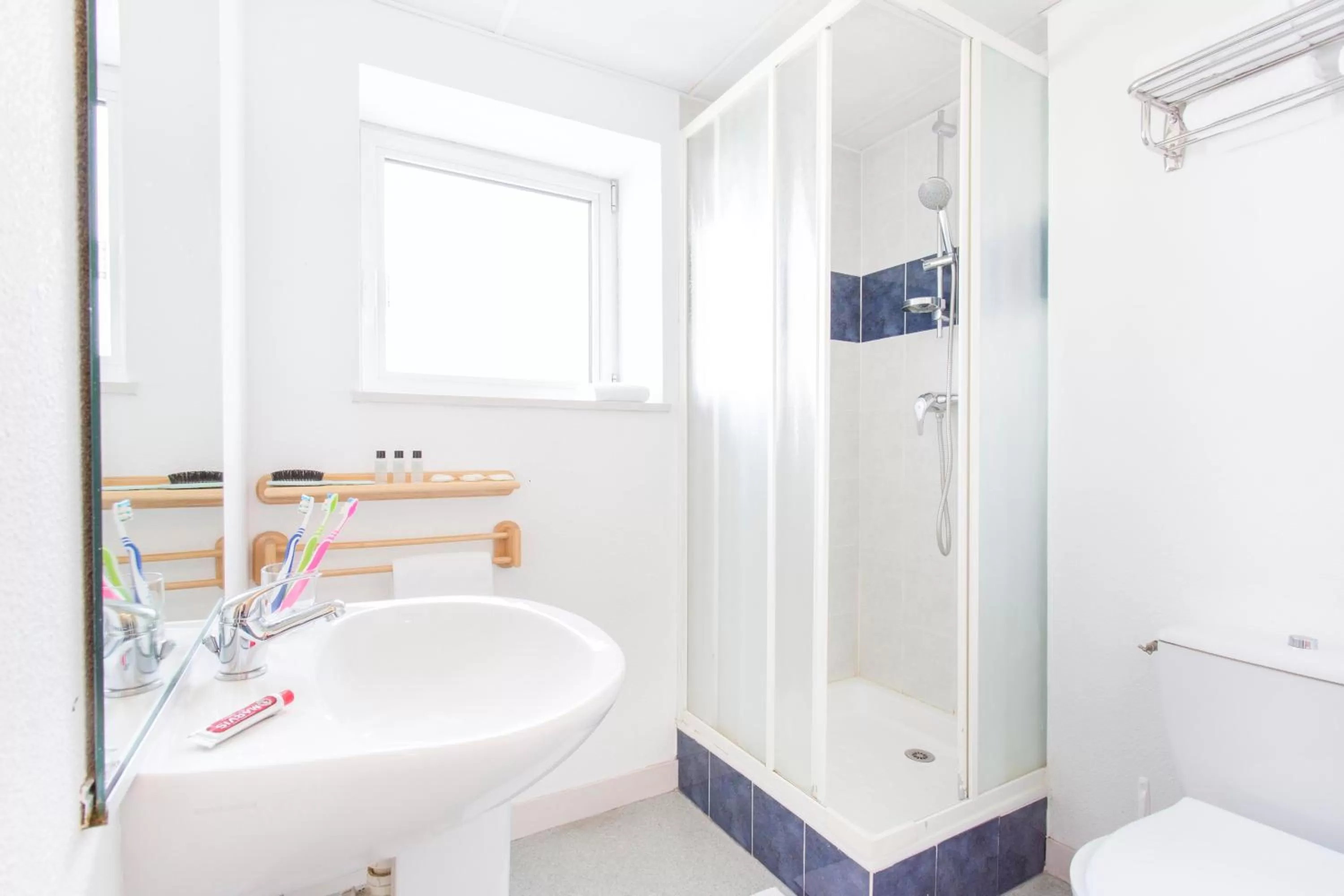 Bedroom in Hôtel Les Gens De Mer Lorient by Popinns