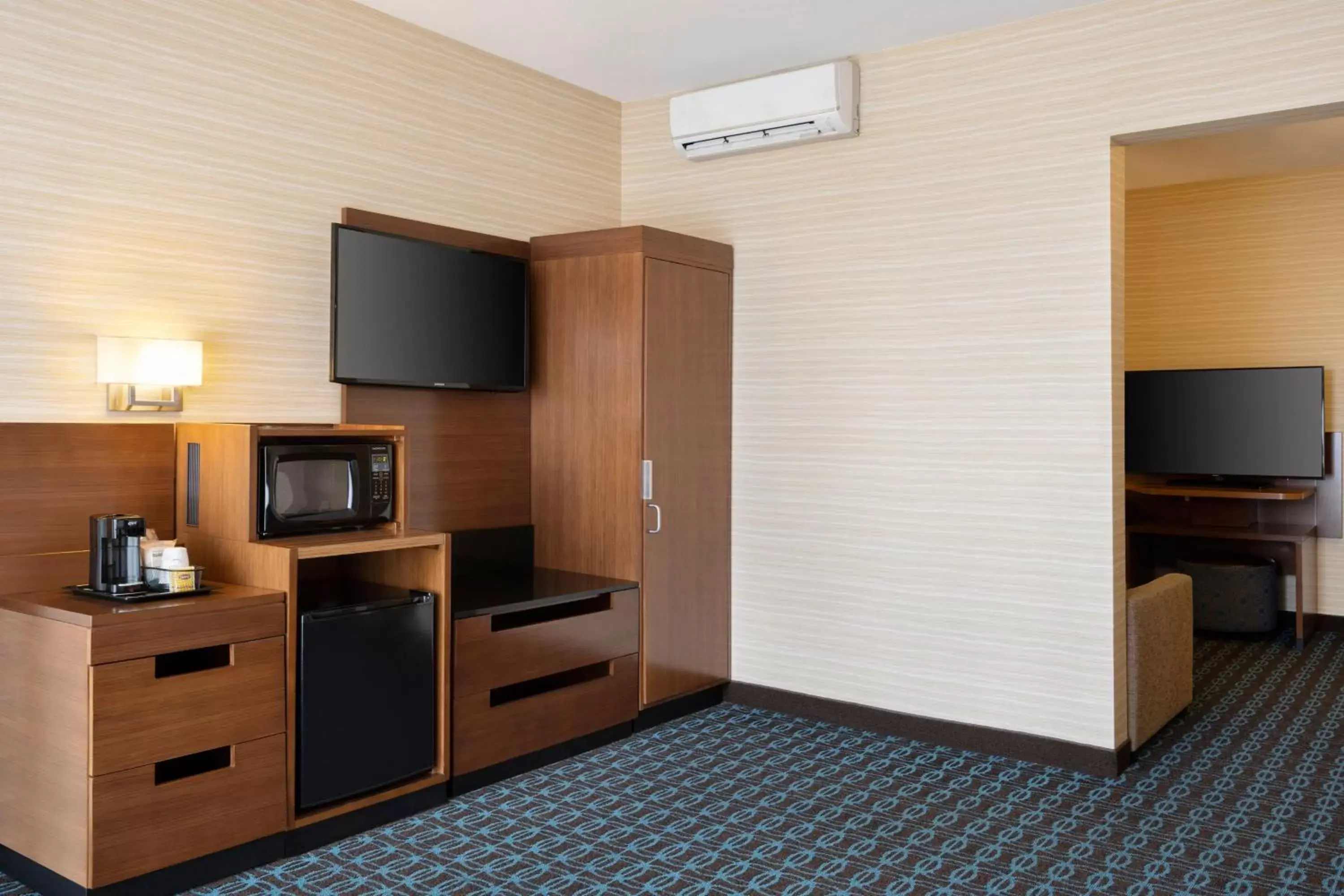 Photo of the whole room, TV/Entertainment Center in Fairfield Inn & Suites by Marriott Los Angeles LAX/El Segundo