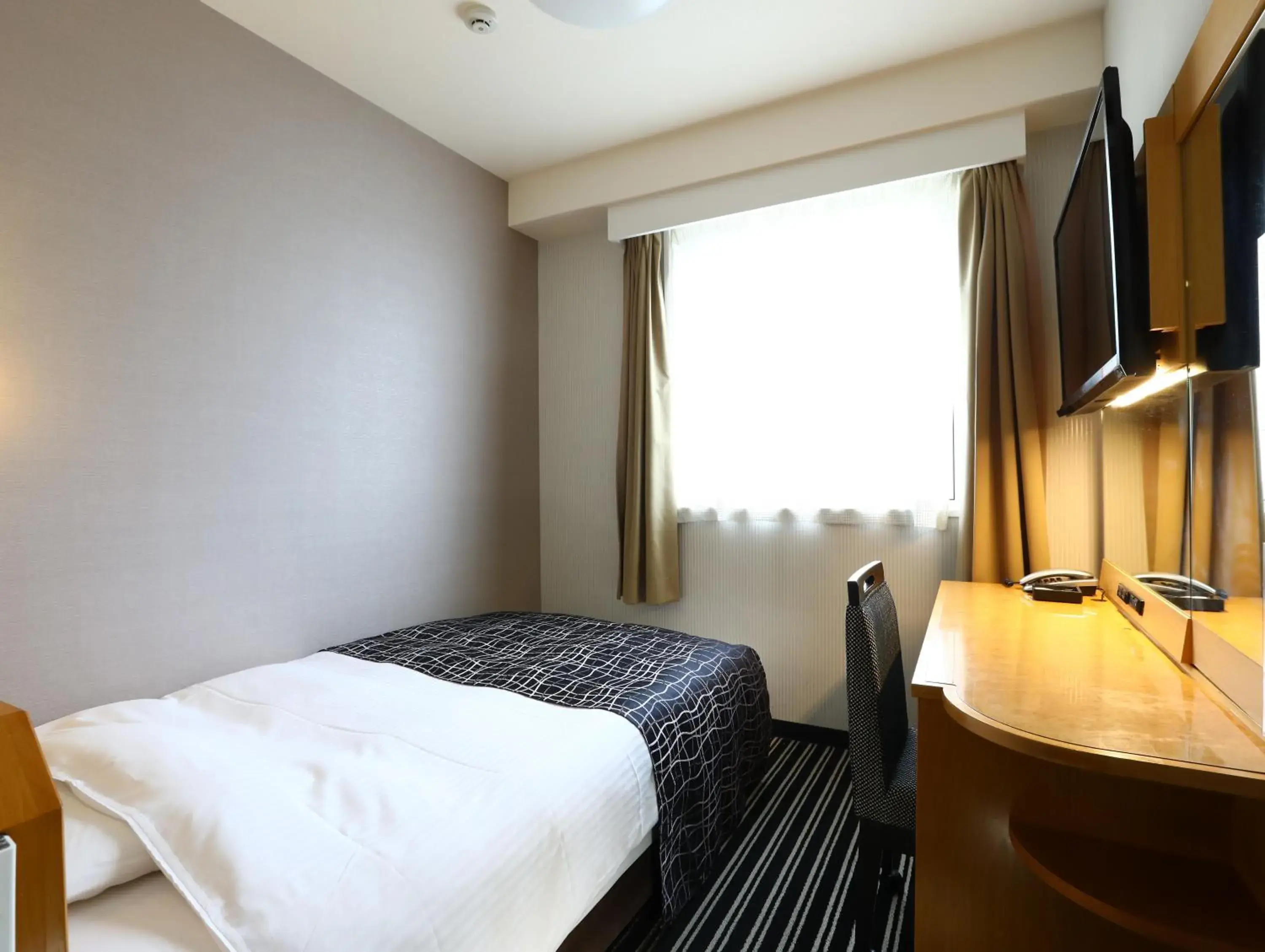 Bed in APA Hotel Tokyo Itabashi Ekimae