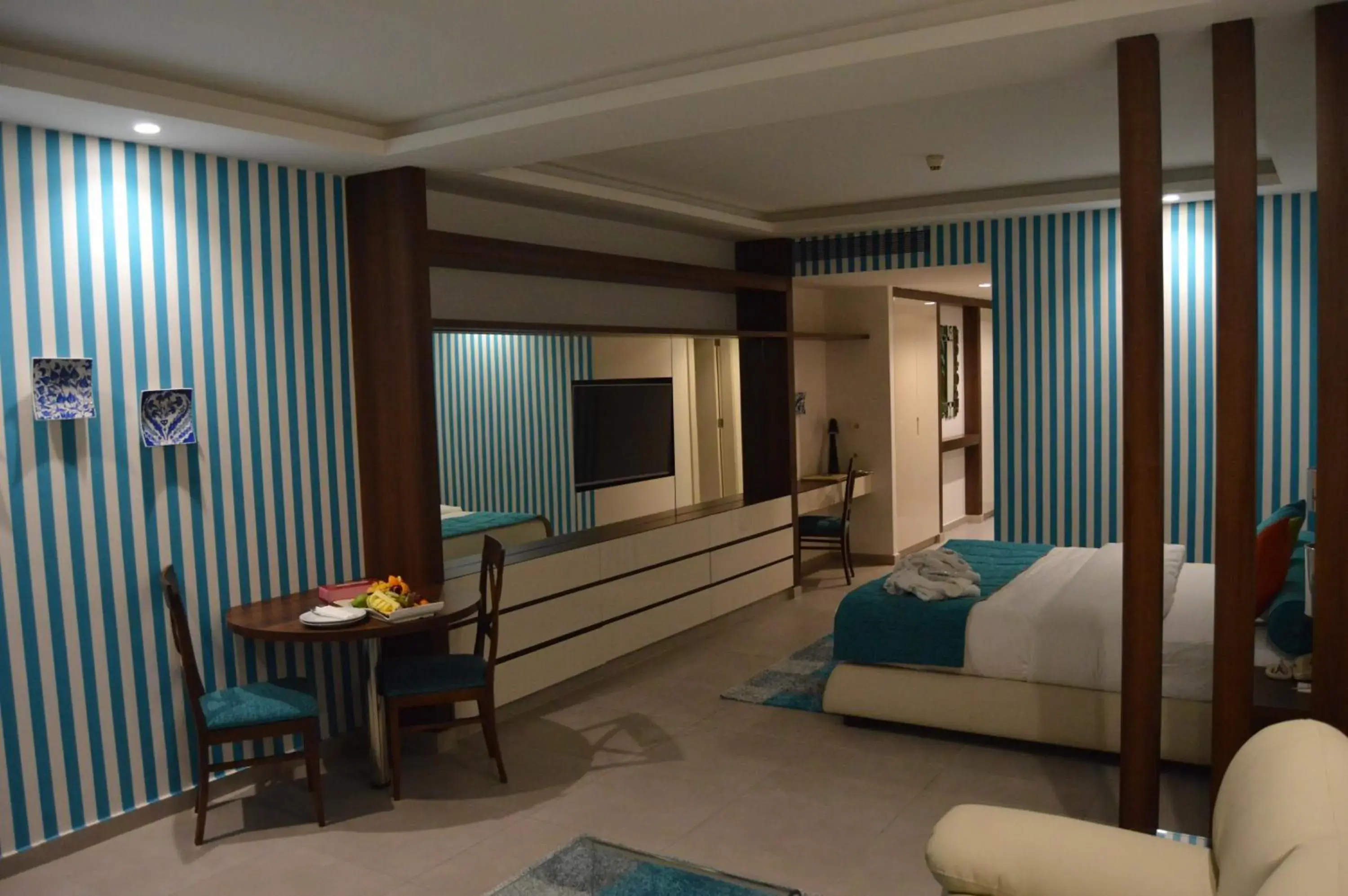 Photo of the whole room, TV/Entertainment Center in Markazia Suites