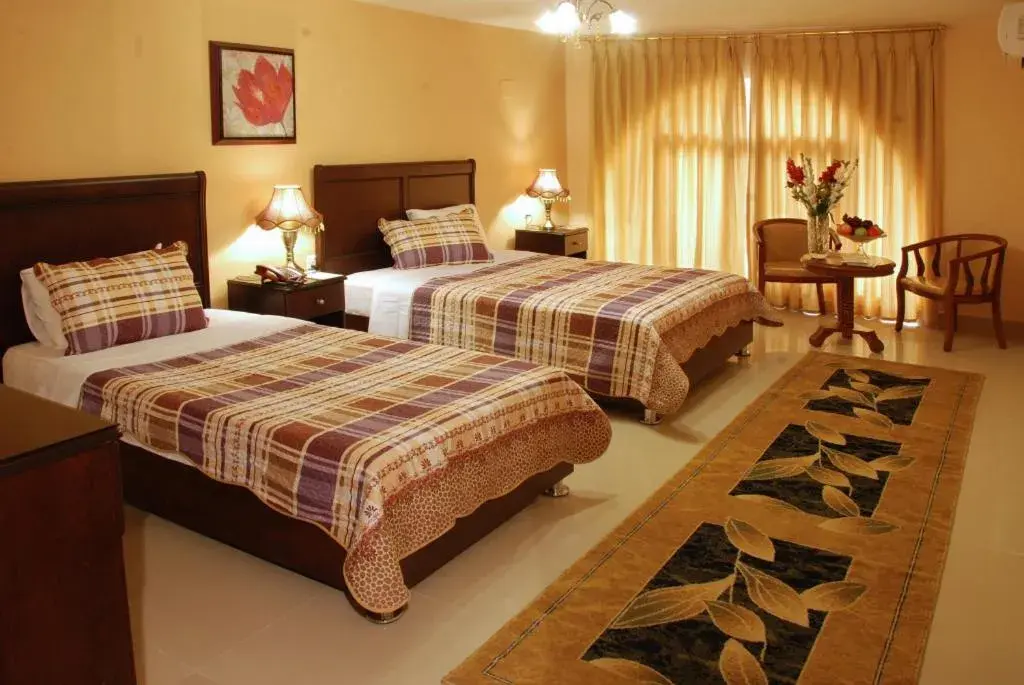 Bed in Jardaneh Hotel