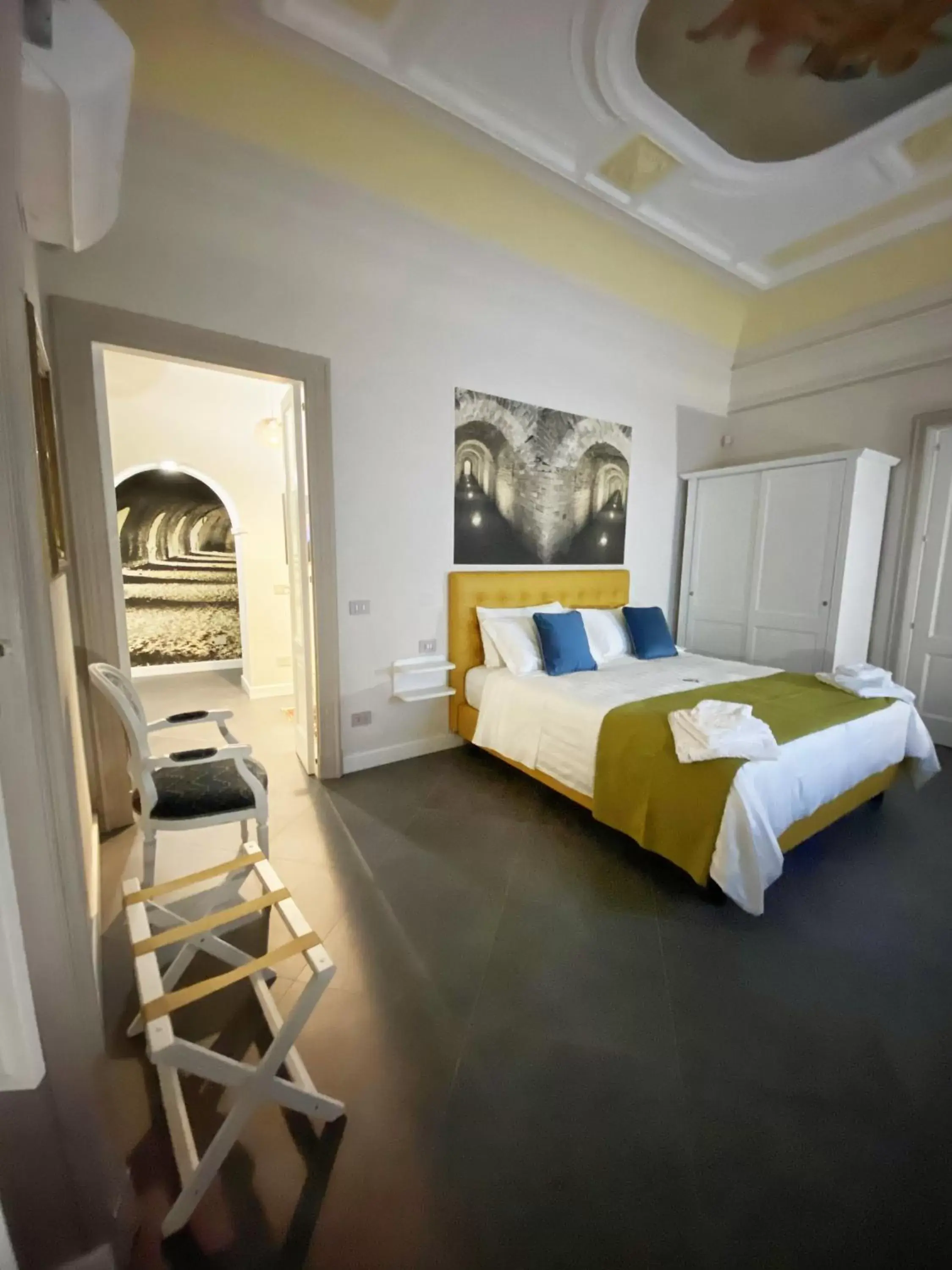 Bed in ANFITEATRO LE SUITES