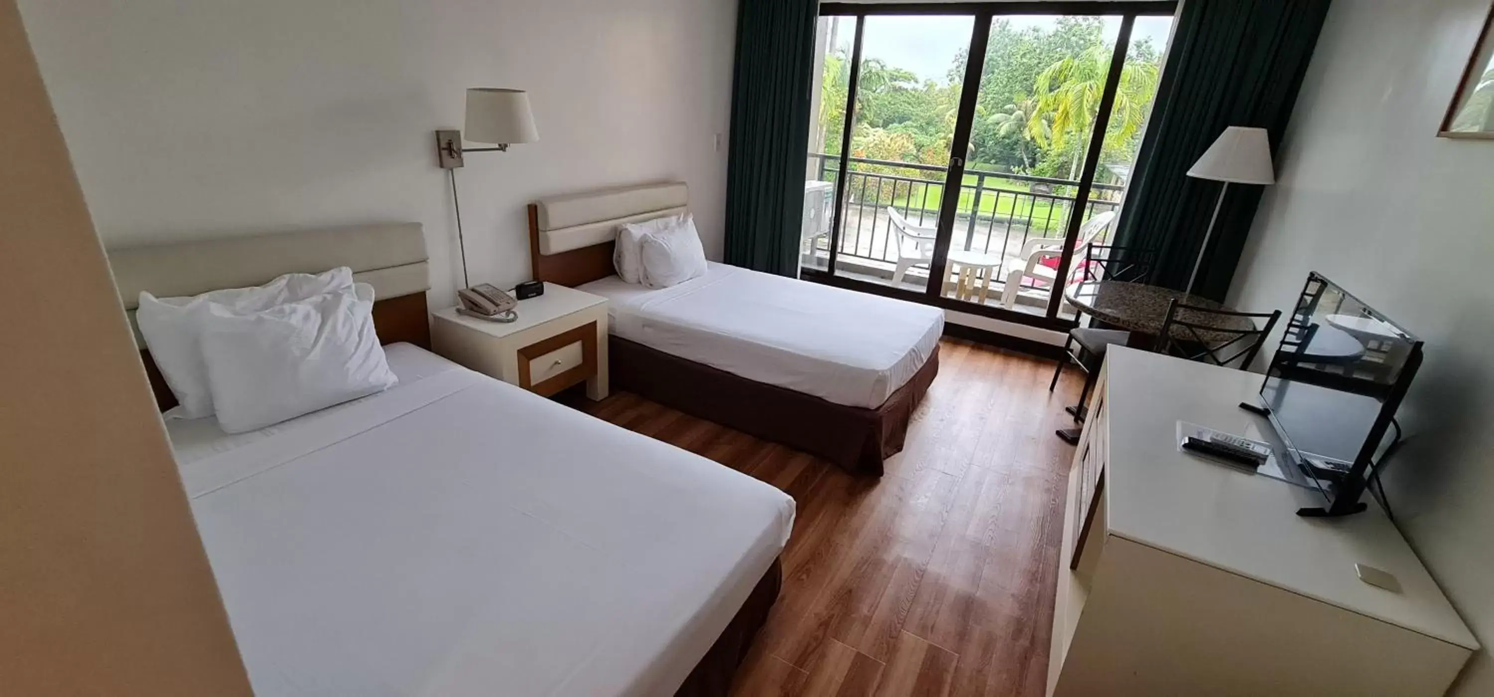 Bed in SureStay Hotel by Best Western Guam Palmridge