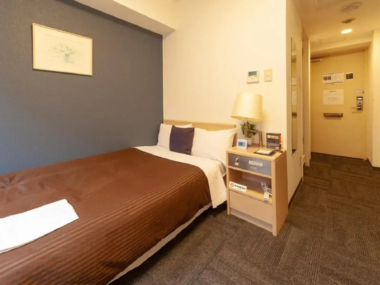 Bed in HOTEL LiVEMAX BUDGET Shinbashi