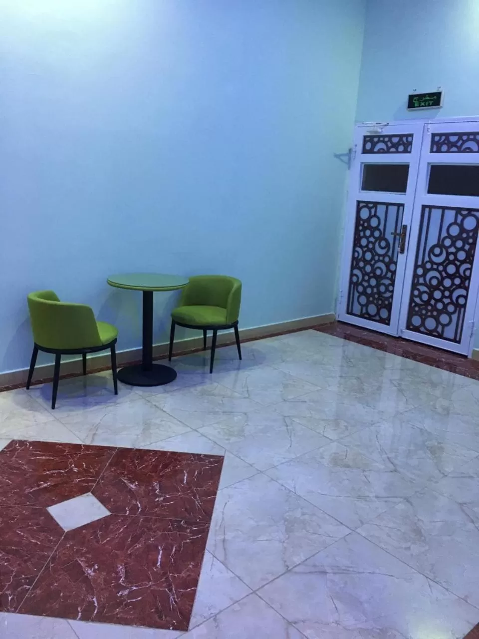 Seating area in Ibra Plaza Hotel