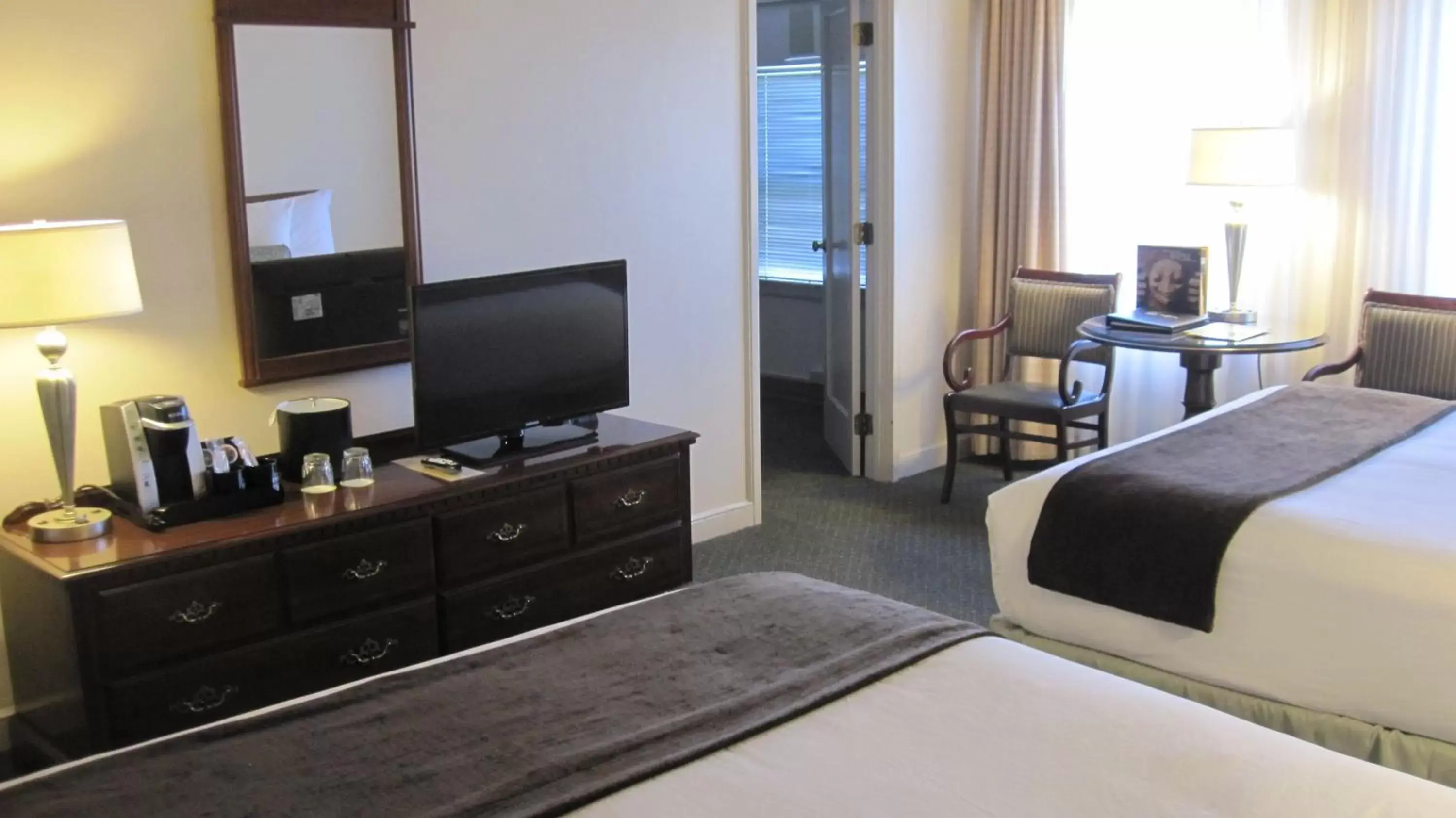 Bedroom, TV/Entertainment Center in The Inn at Virginia Mason