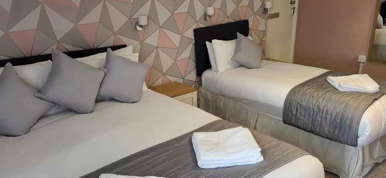 Bed in Parkwood Hotel