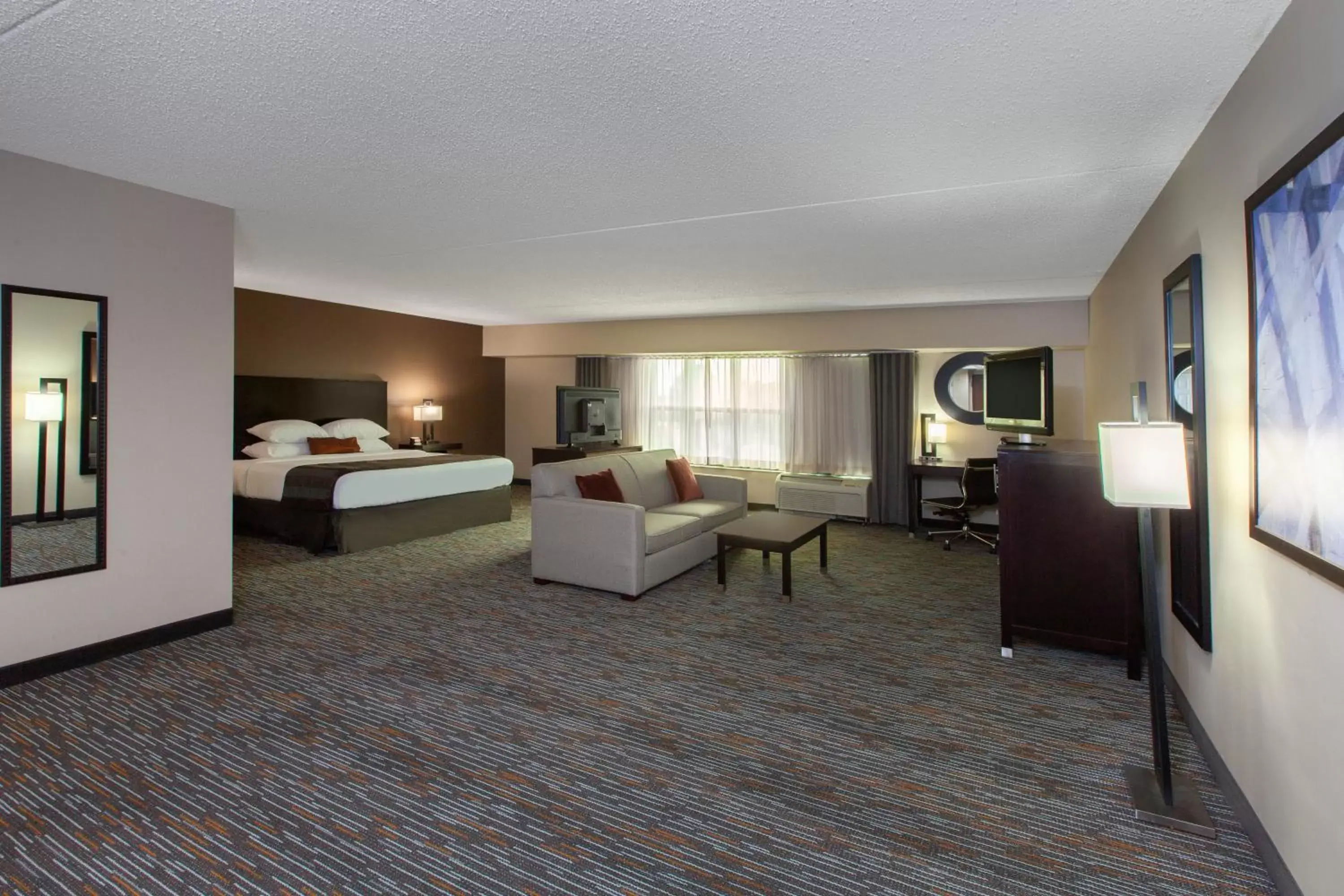 Photo of the whole room, Seating Area in Wingate by Wyndham Oklahoma City Airport