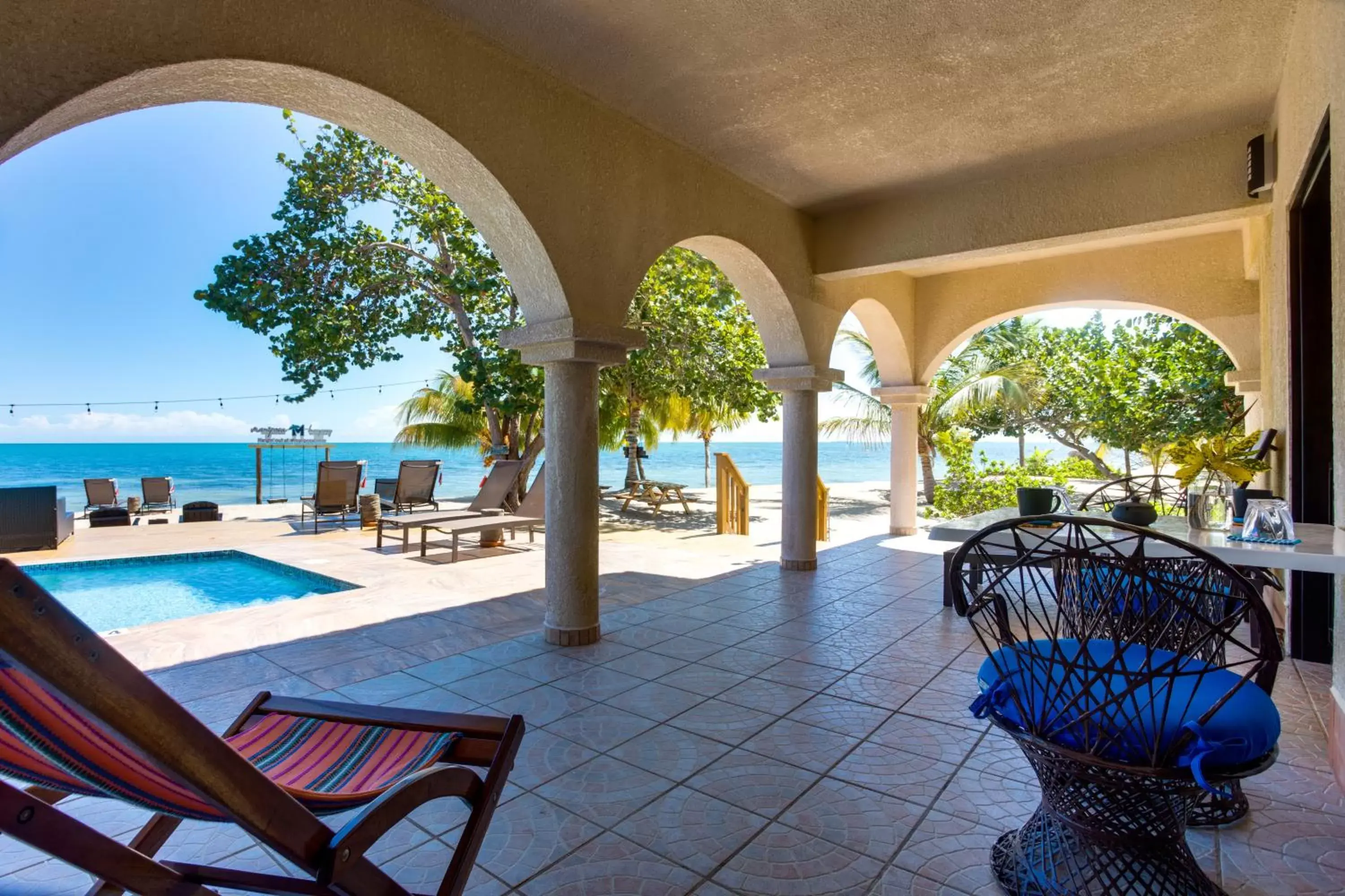 Patio, Swimming Pool in Mariposa Belize Beach Resort