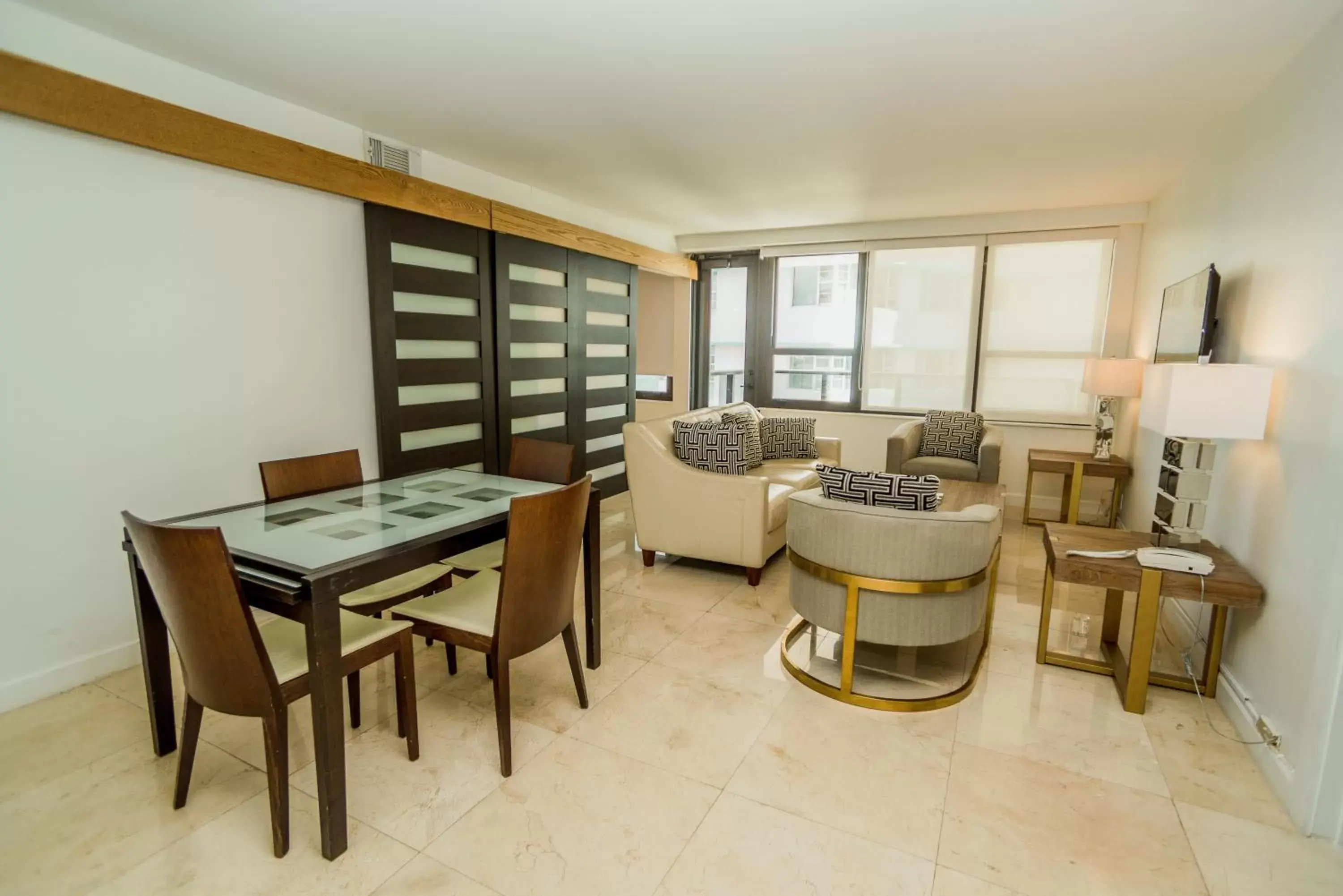 Living room, Dining Area in The Alexander Beach Residences